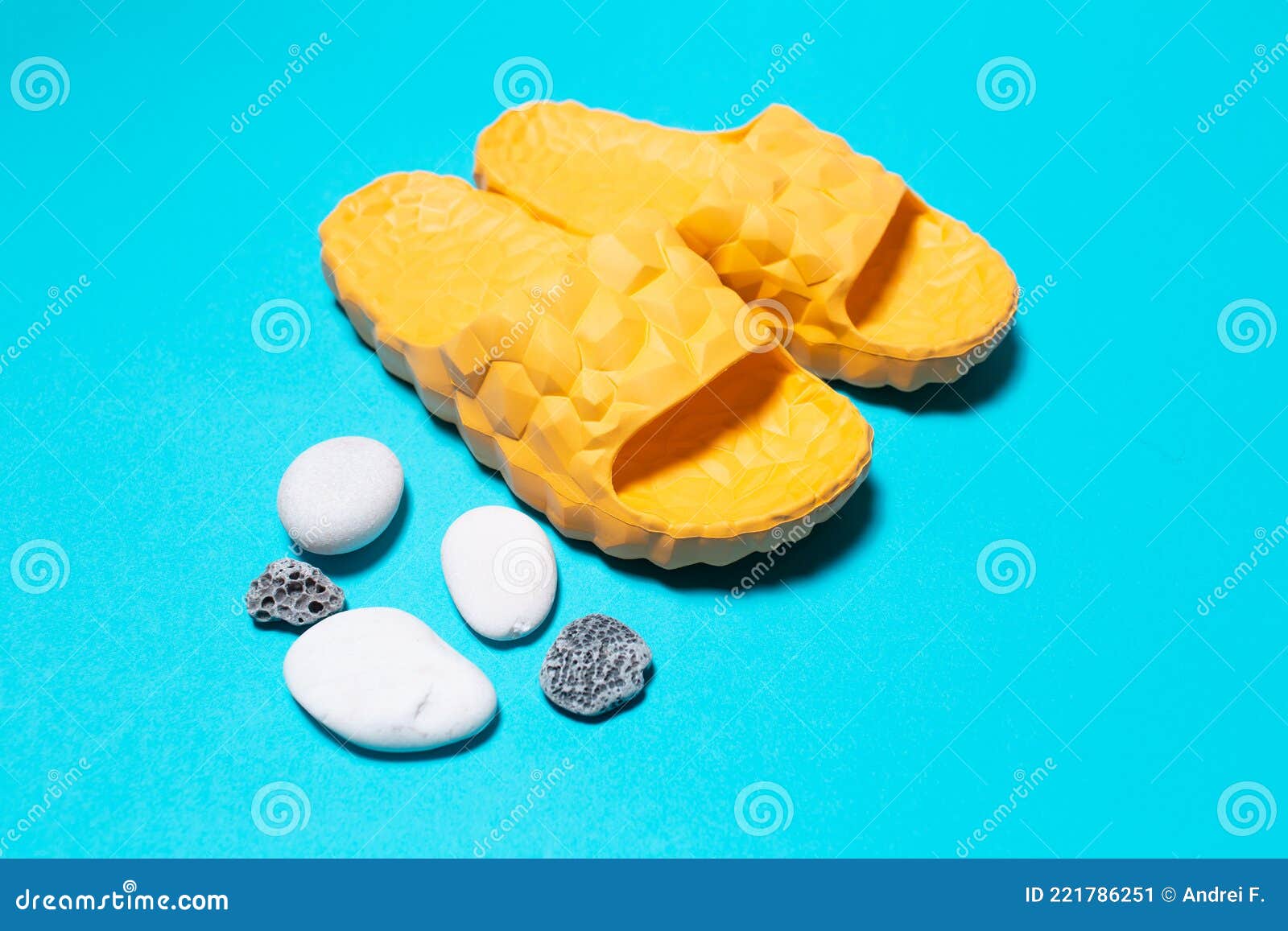 grey and yellow slippers