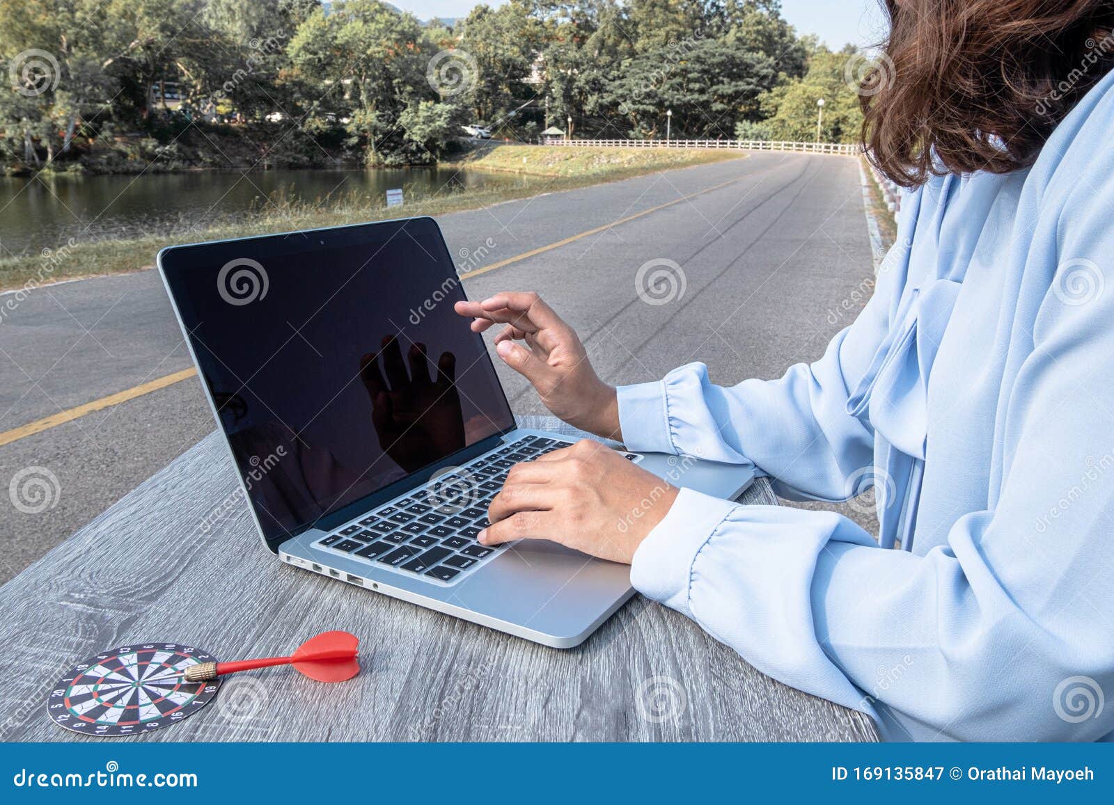 Close Up Of Young Business Women Working On Laptop For Online