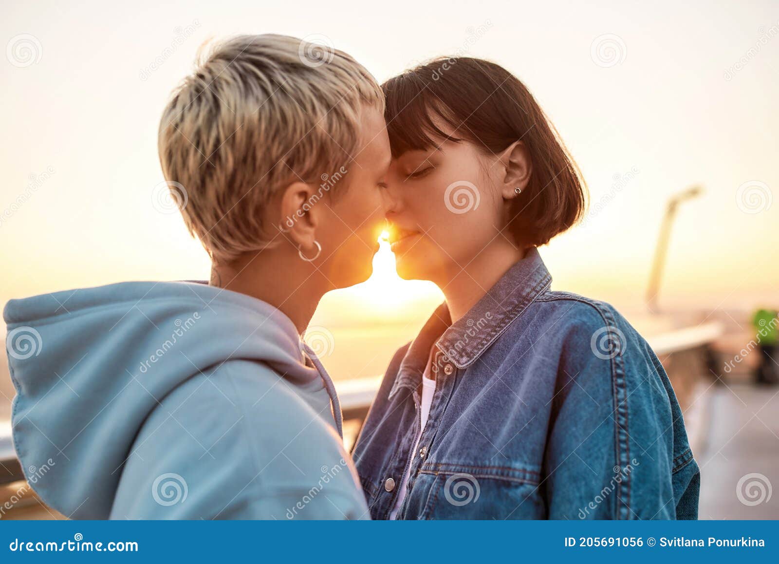 Close Up of Young Passionate Lesbian Couple Kissing Outdoors, Two Girls