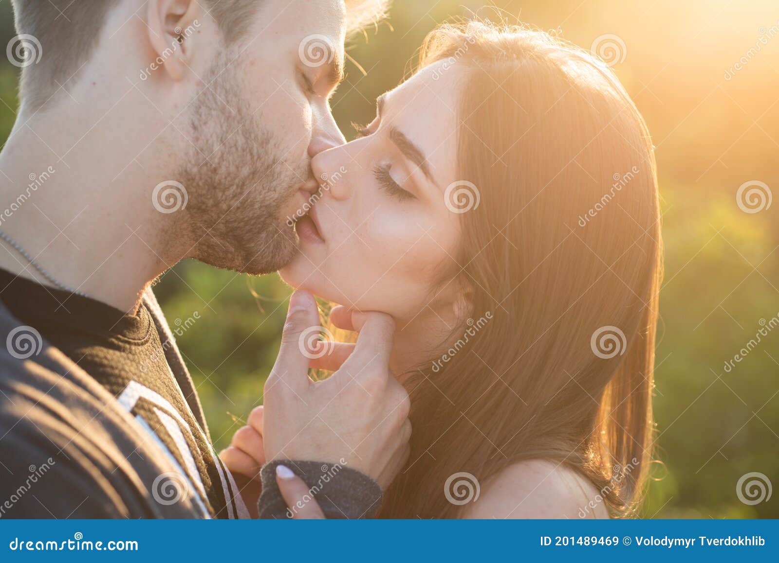 Close-up of Young Romantic Couple is Kissing. Profile of Beautiful ...