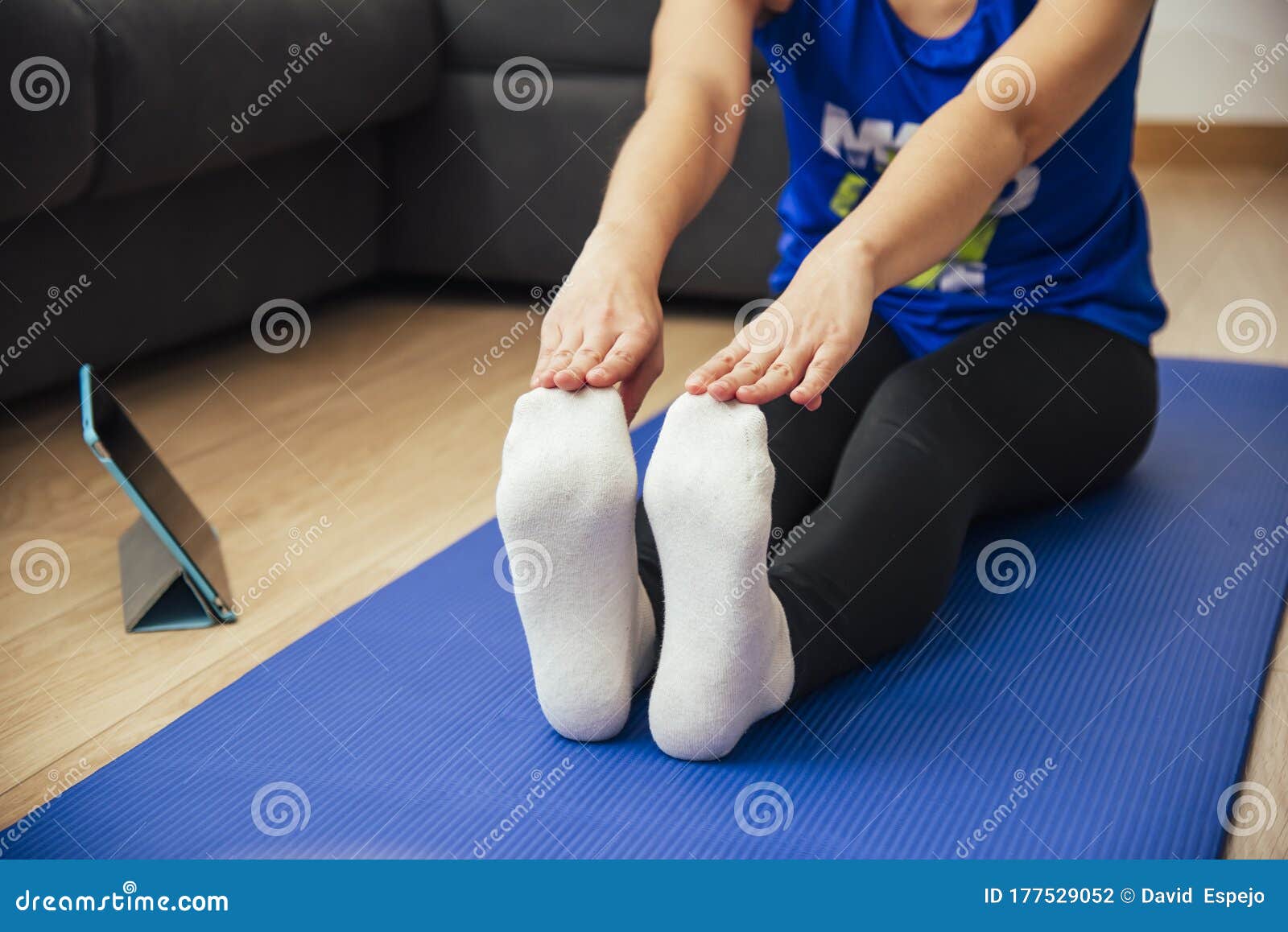 Close-up of a Young Woman Stretching at Home Stock Photo - Image of ...