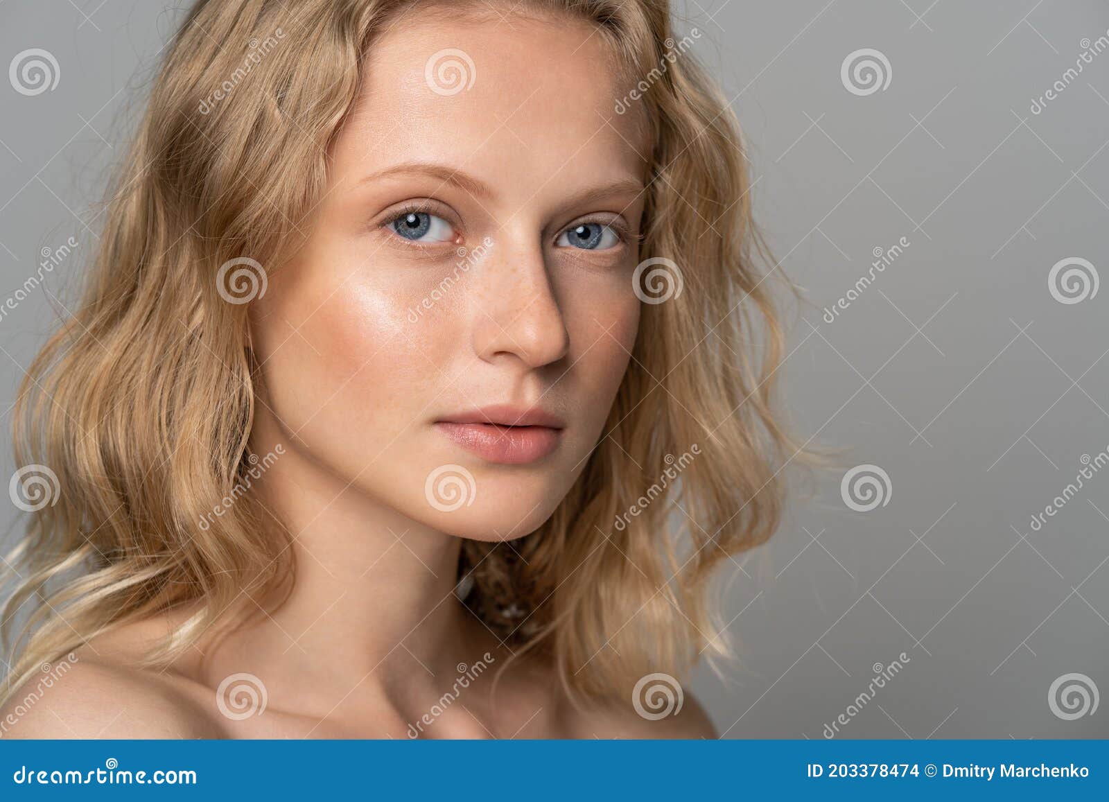 Close Up of Young Woman Face with Blue Eyes, Curly Natural Blonde Hair and  Eyebrows, Has No Makeup, Looking at Camera. Girl with Stock Photo - Image  of nude, blue: 203378474