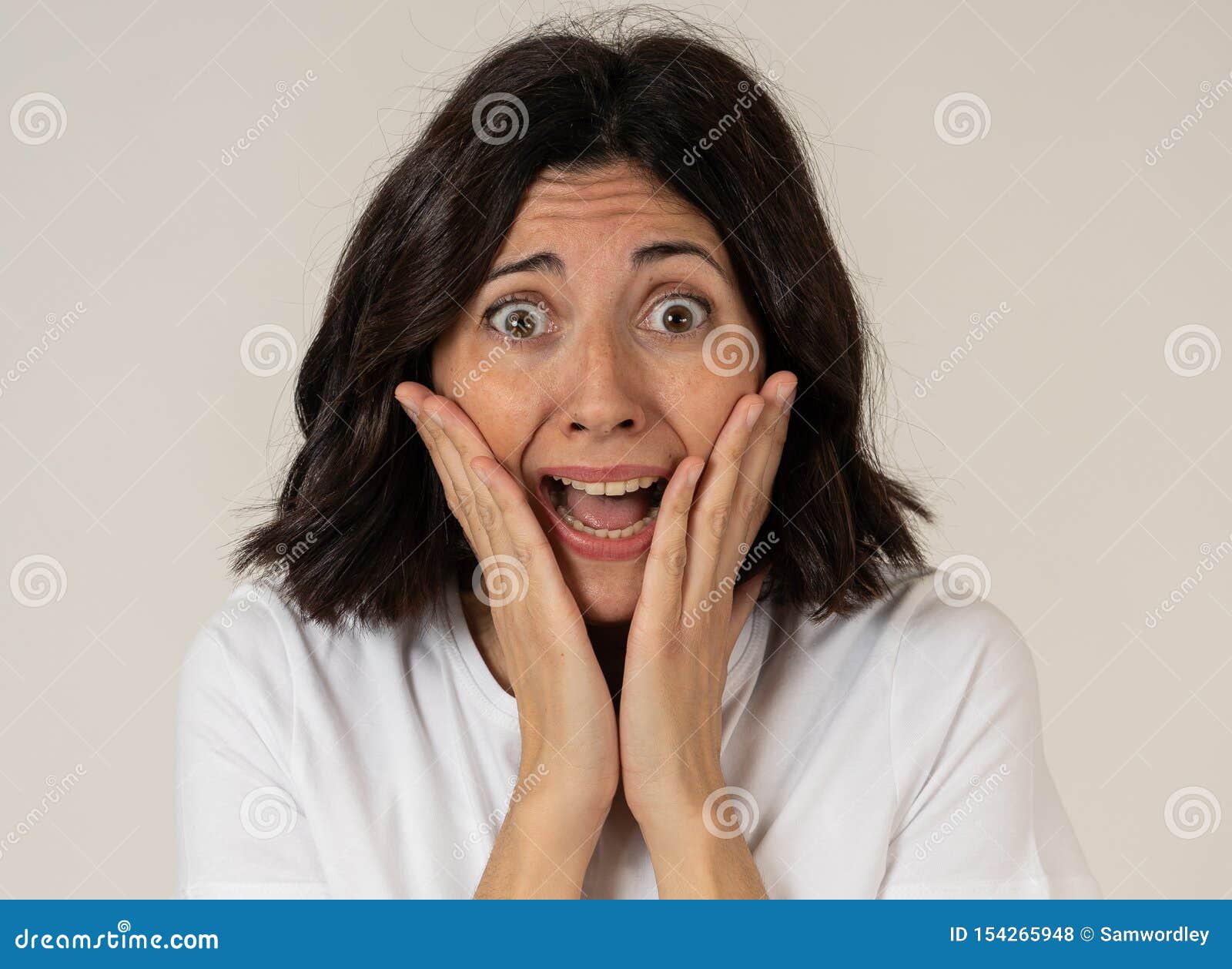 Portrait Of A Young Attractive Woman Looking Scared And Shockedhuman