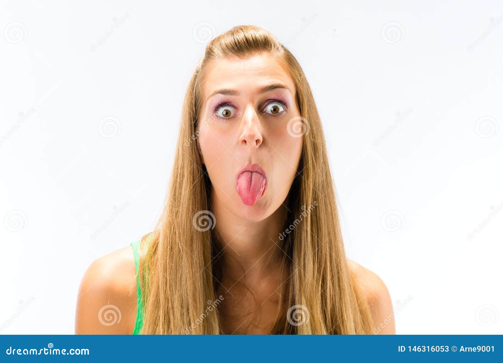 Young Woman Teasing With Sticking Her Tongue Out Stock Image Image Of Expressive Portrait 