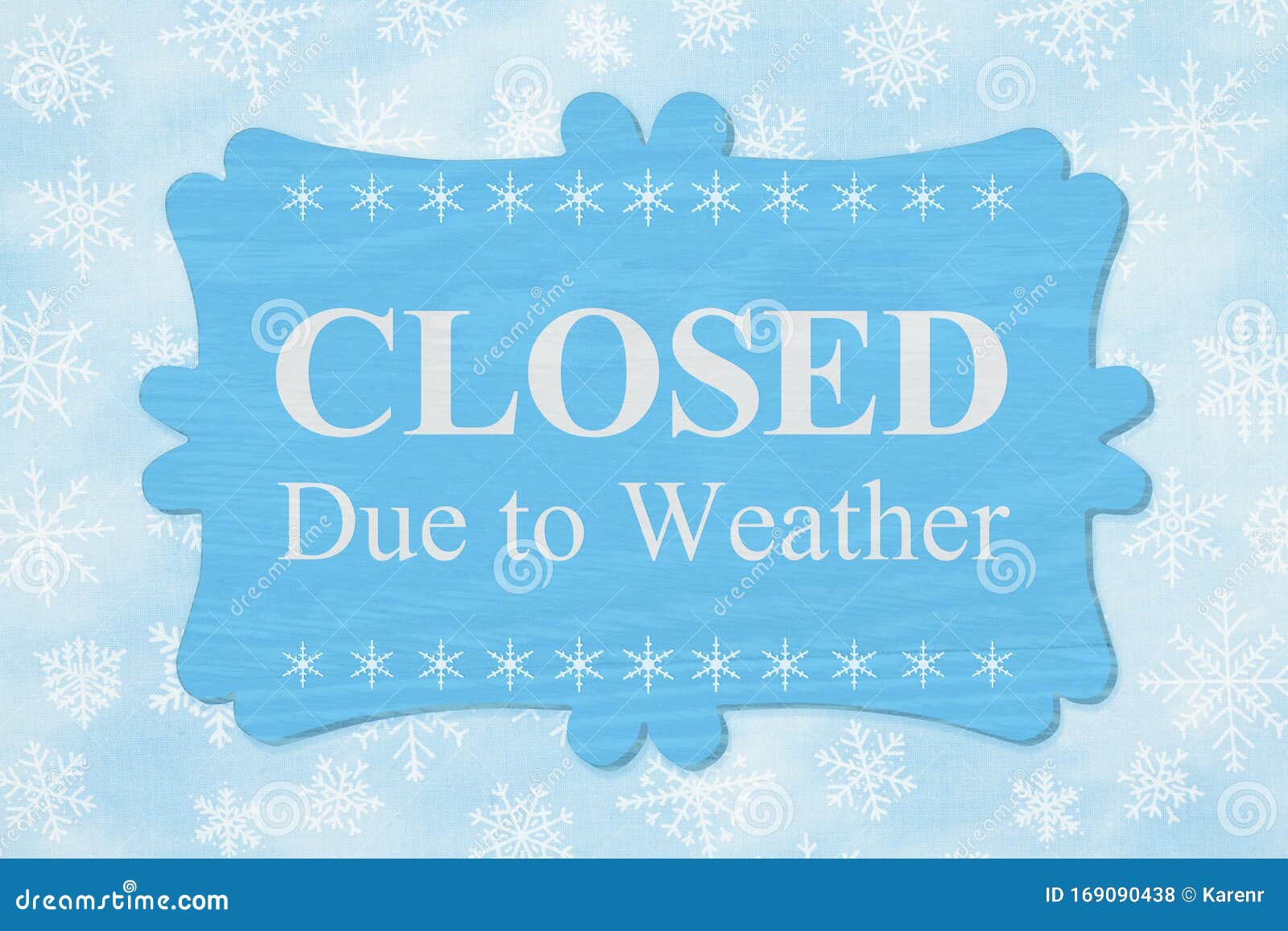 closed due to weather message on a wood sign