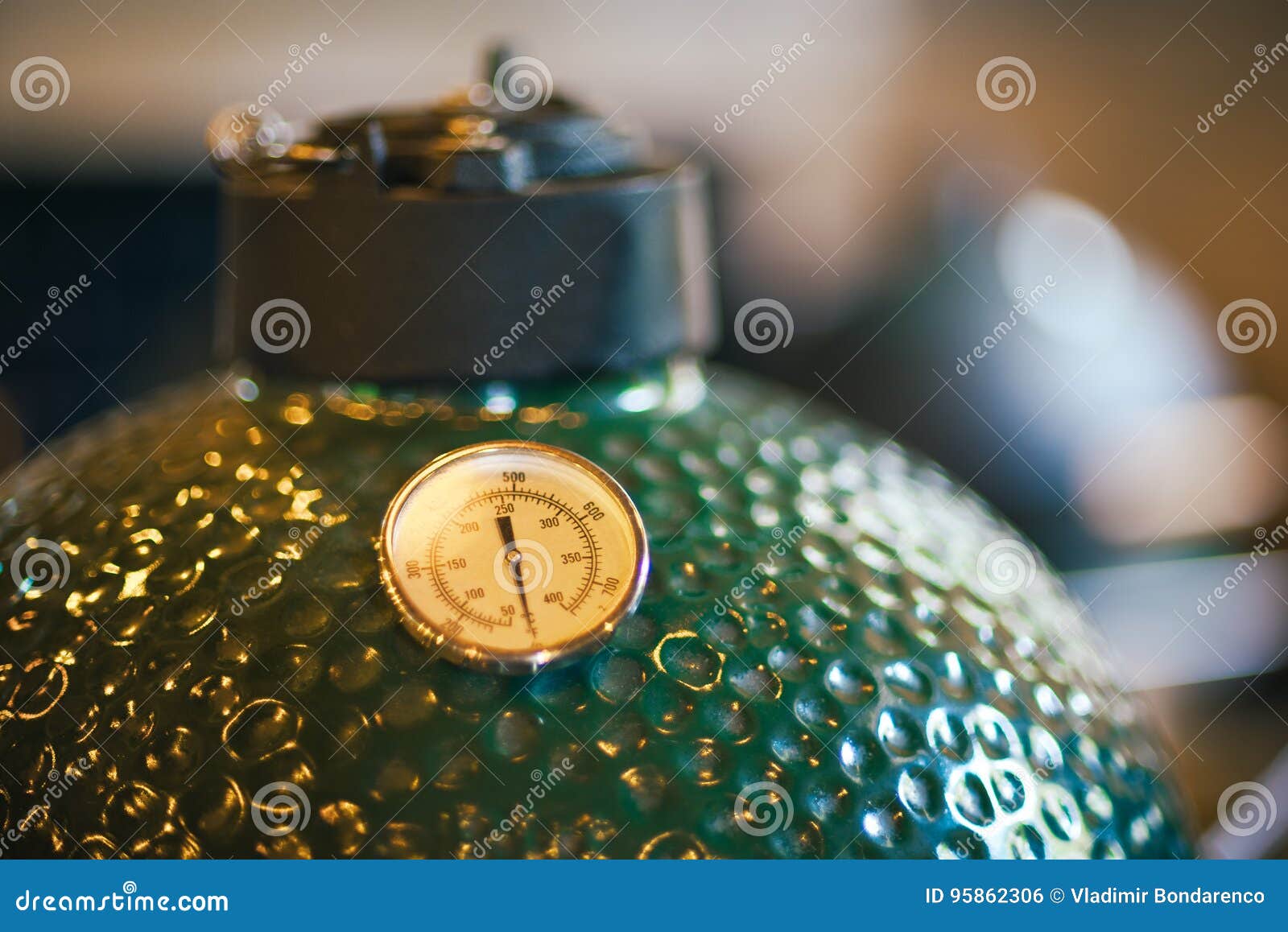 Closed Grill, Green Grill in the Restaurant, on a Defocused Background