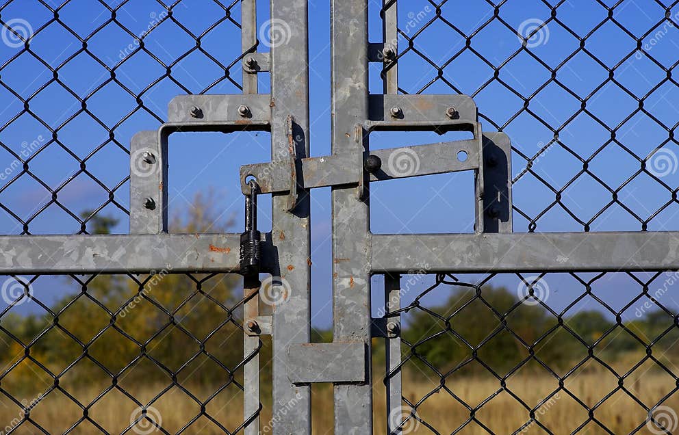 Closed and locked gates stock photo. Image of lock, exit 309174