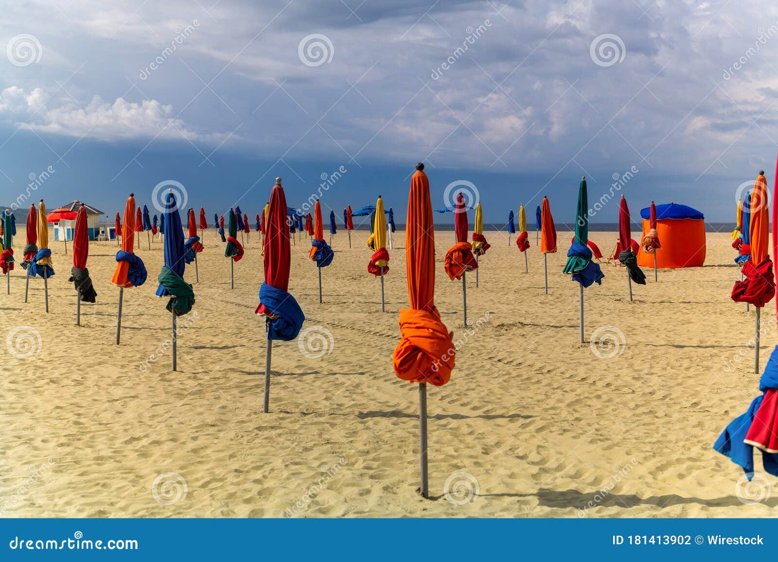 Closed Umbrellas In The Beach On A Gloomy Day Stock Photo Image of