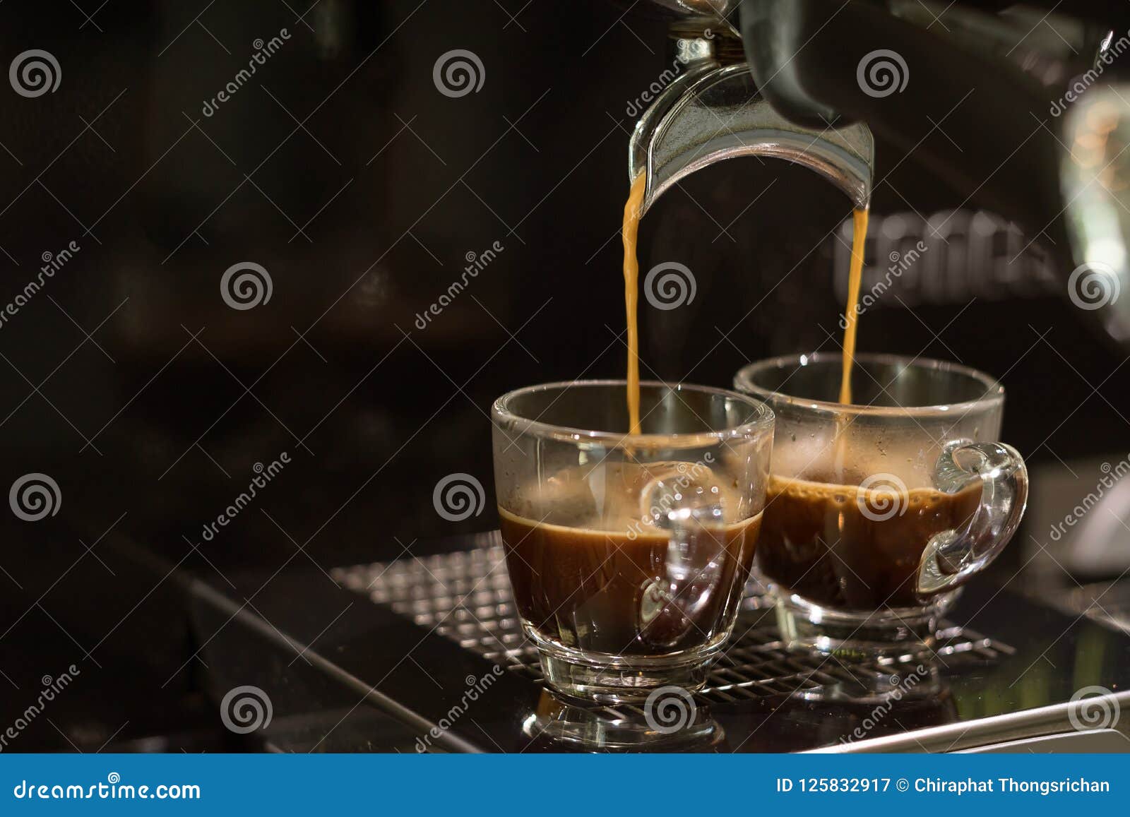 Close-up of espresso coffee in a single shot glass cup with saucer