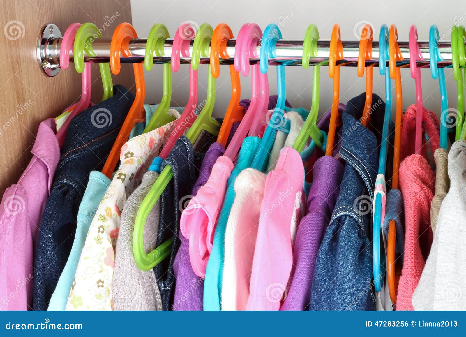 Closet with Baby Dresses on Hangers Stock Photo Image of closet