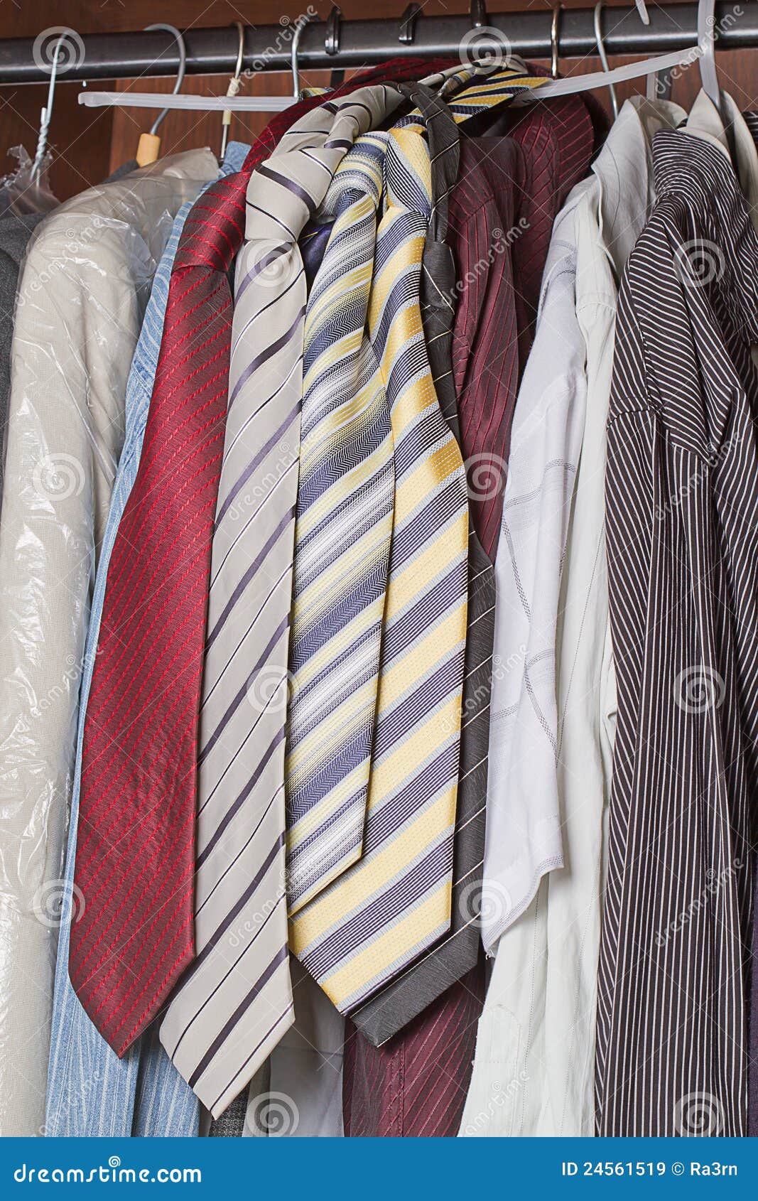 Closet of clothes for men stock image. Image of closeup 24561519