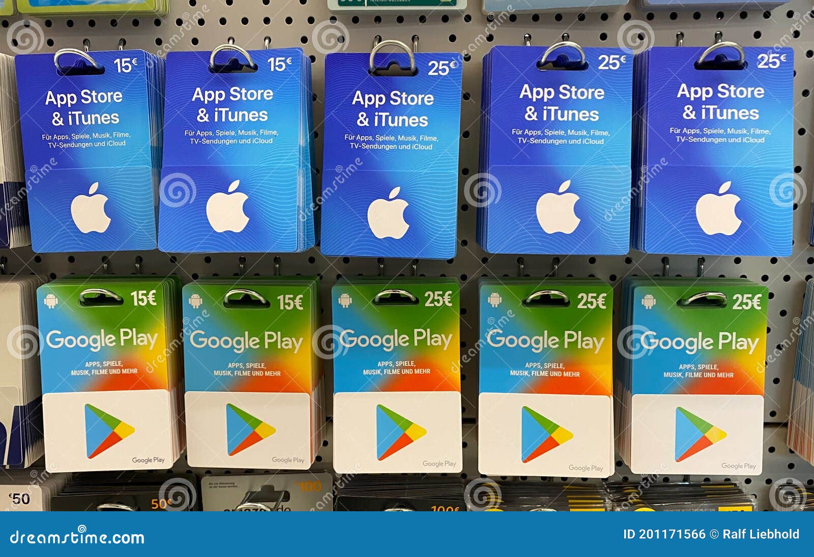 Closeup of Apple App Store ITunes and Google Play Voucher Gift Cards in a  Row in Shelf of German Shop Editorial Photo - Image of itunes, apple:  201171566