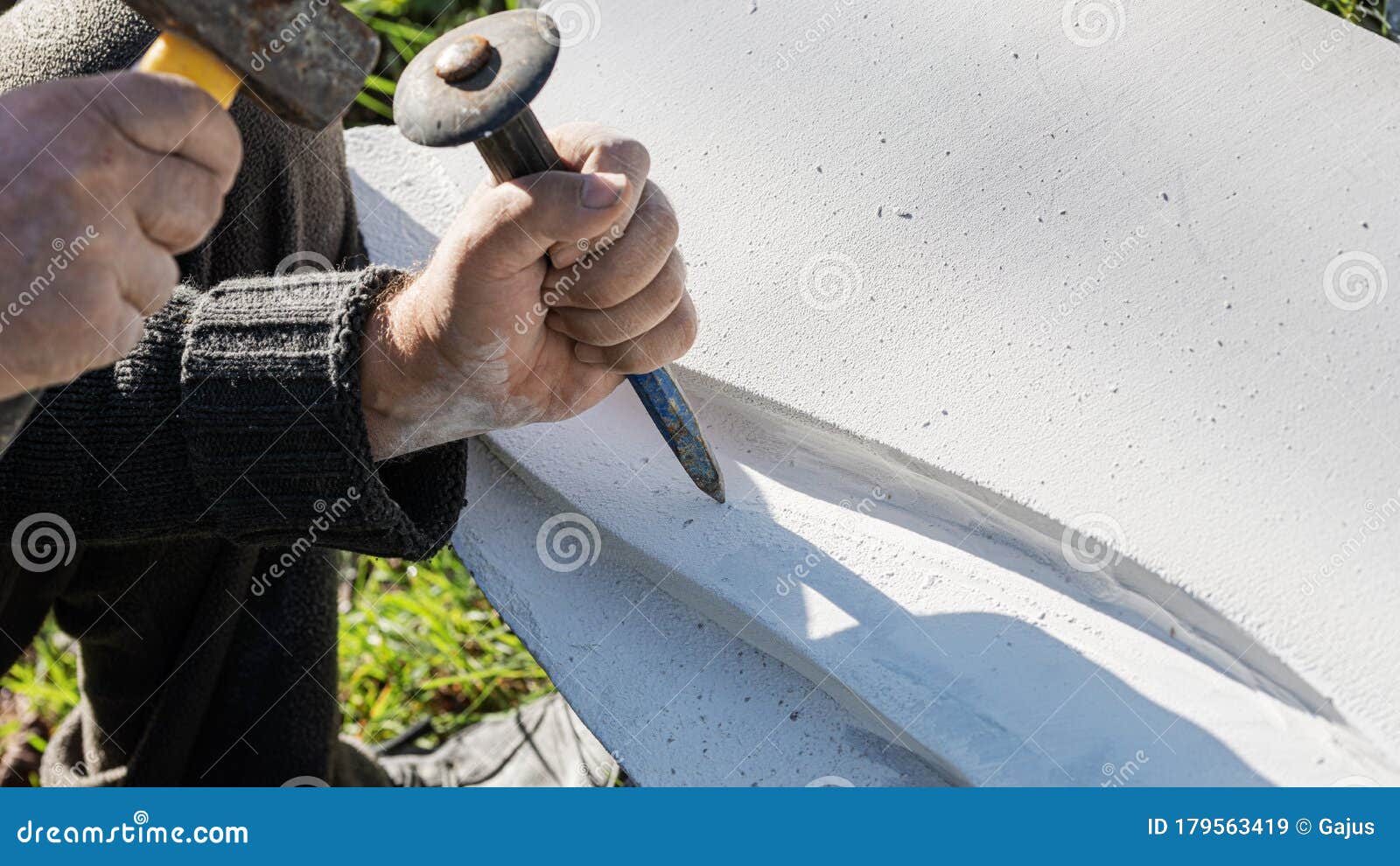 precise work of carving in stone