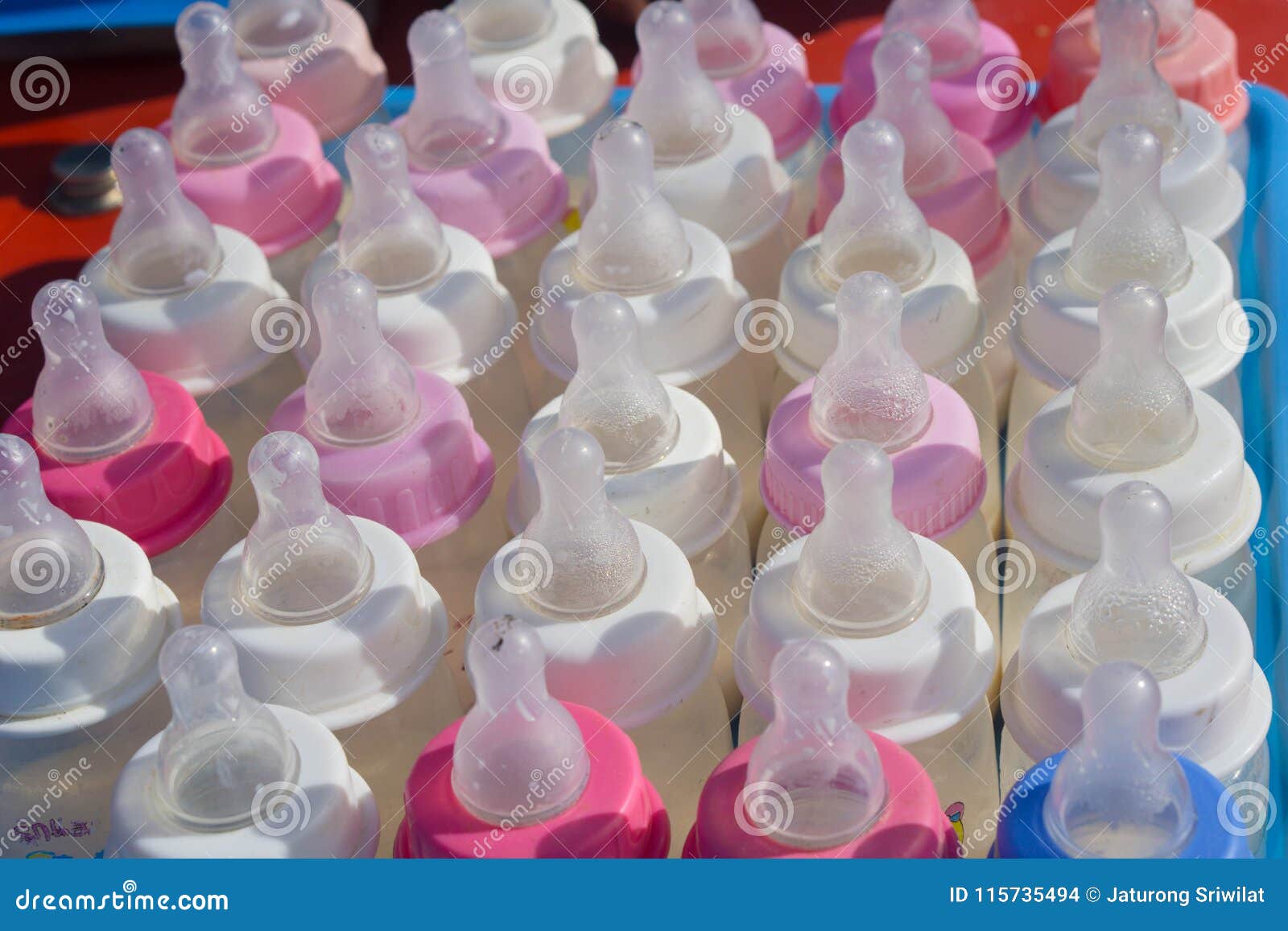 Closeup Baby Bottles, Colors Stock Photo - Image of hygiene, steam ...