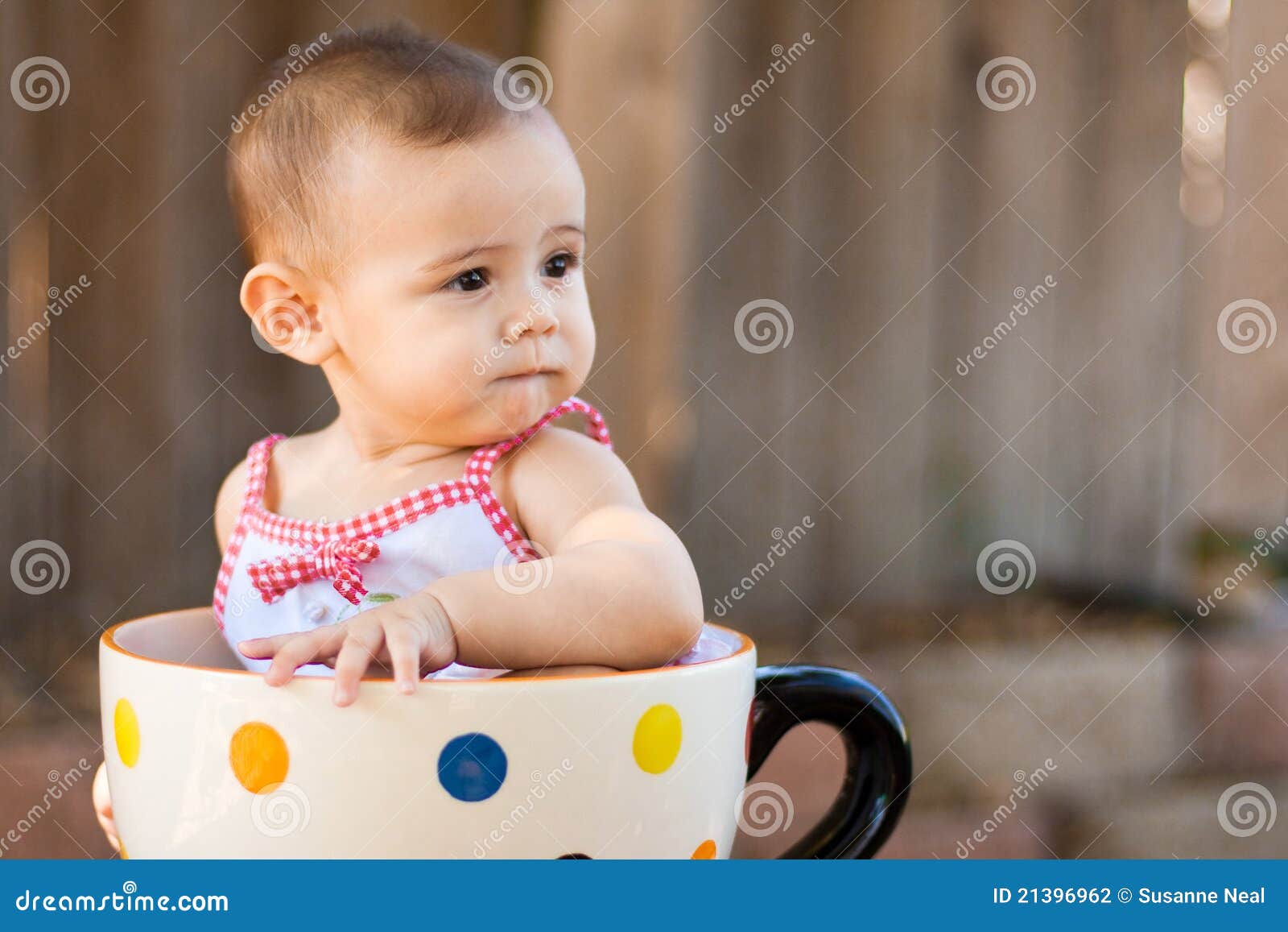 Closeup Of Baby Girl In Giant Teacup Stock Photo - Image 