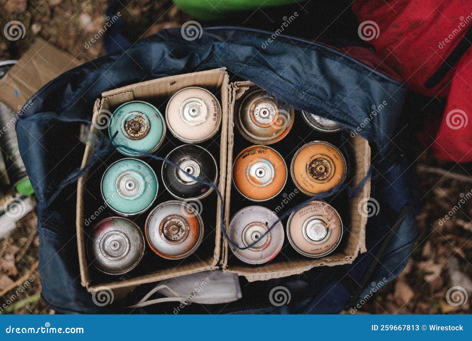 Closeup of the Bag with Graffiti Spray Cans. Editorial Stock Photo