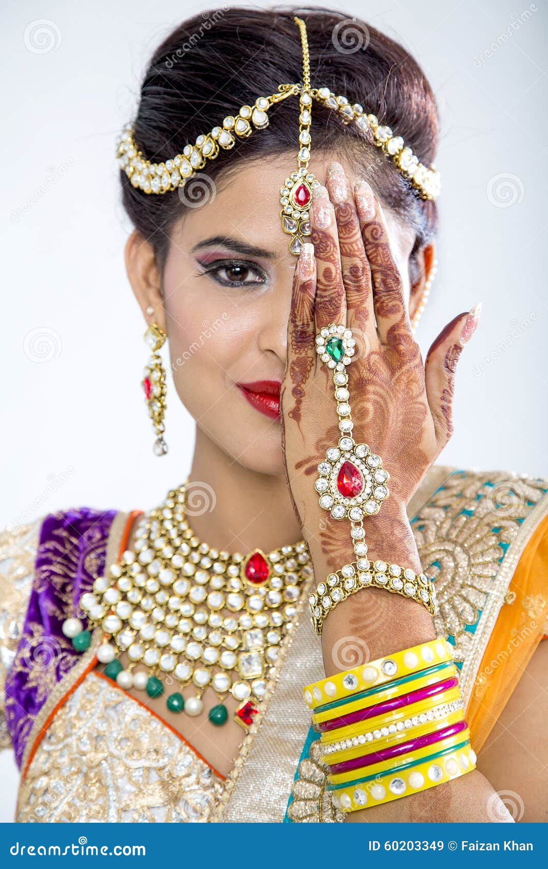 Beautiful Indian bride in traditional wedding dress and posing, Stock  Photo, Picture And Royalty Free Image. Pic. PNT-PIRF-20121217-JH2276 |  agefotostock