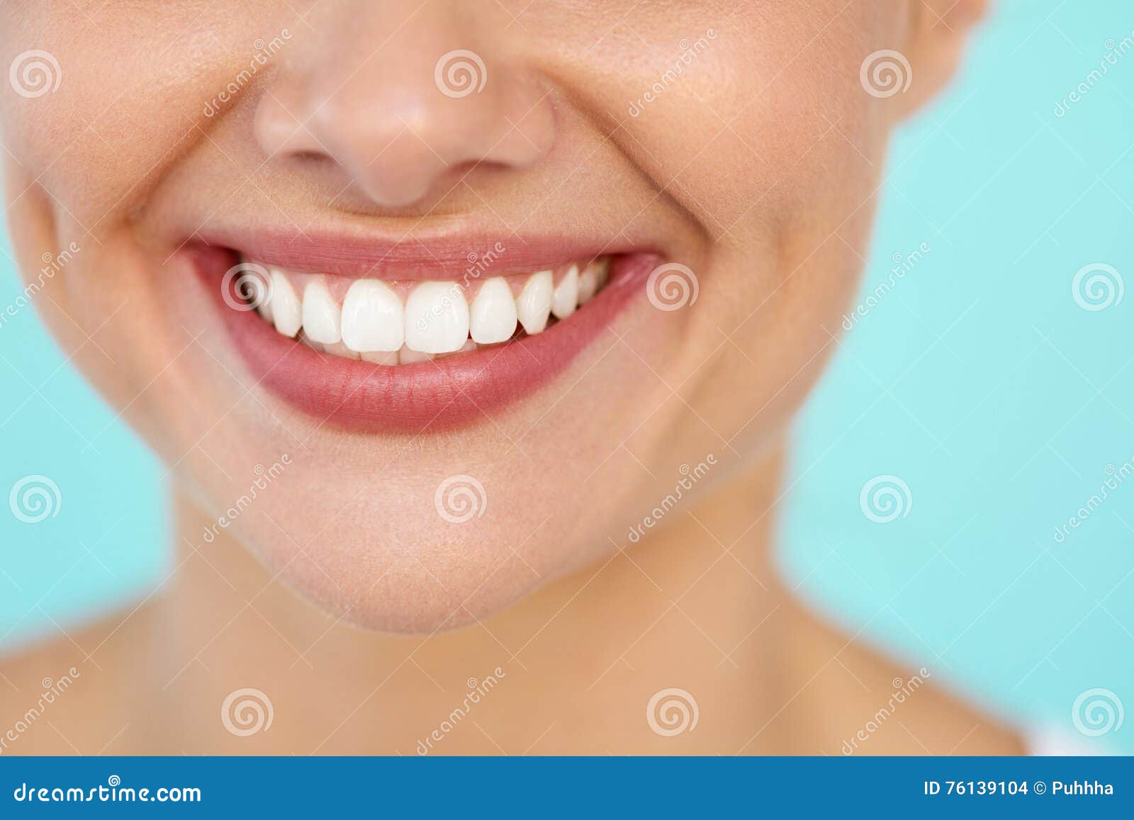 closeup of beautiful smile with white teeth. woman mouth smiling