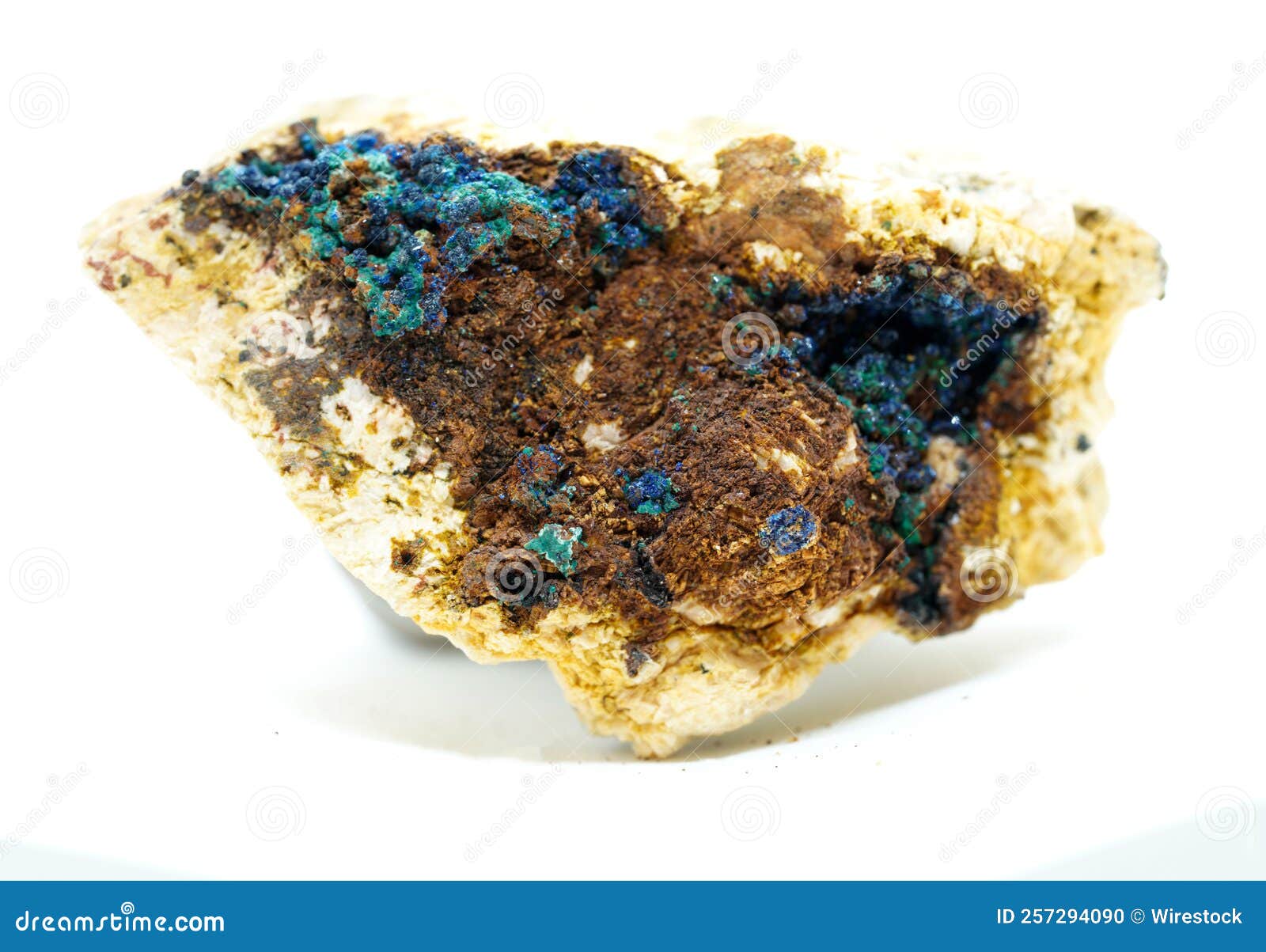 closeup of boleite, a complex halide mineral  on a white background.