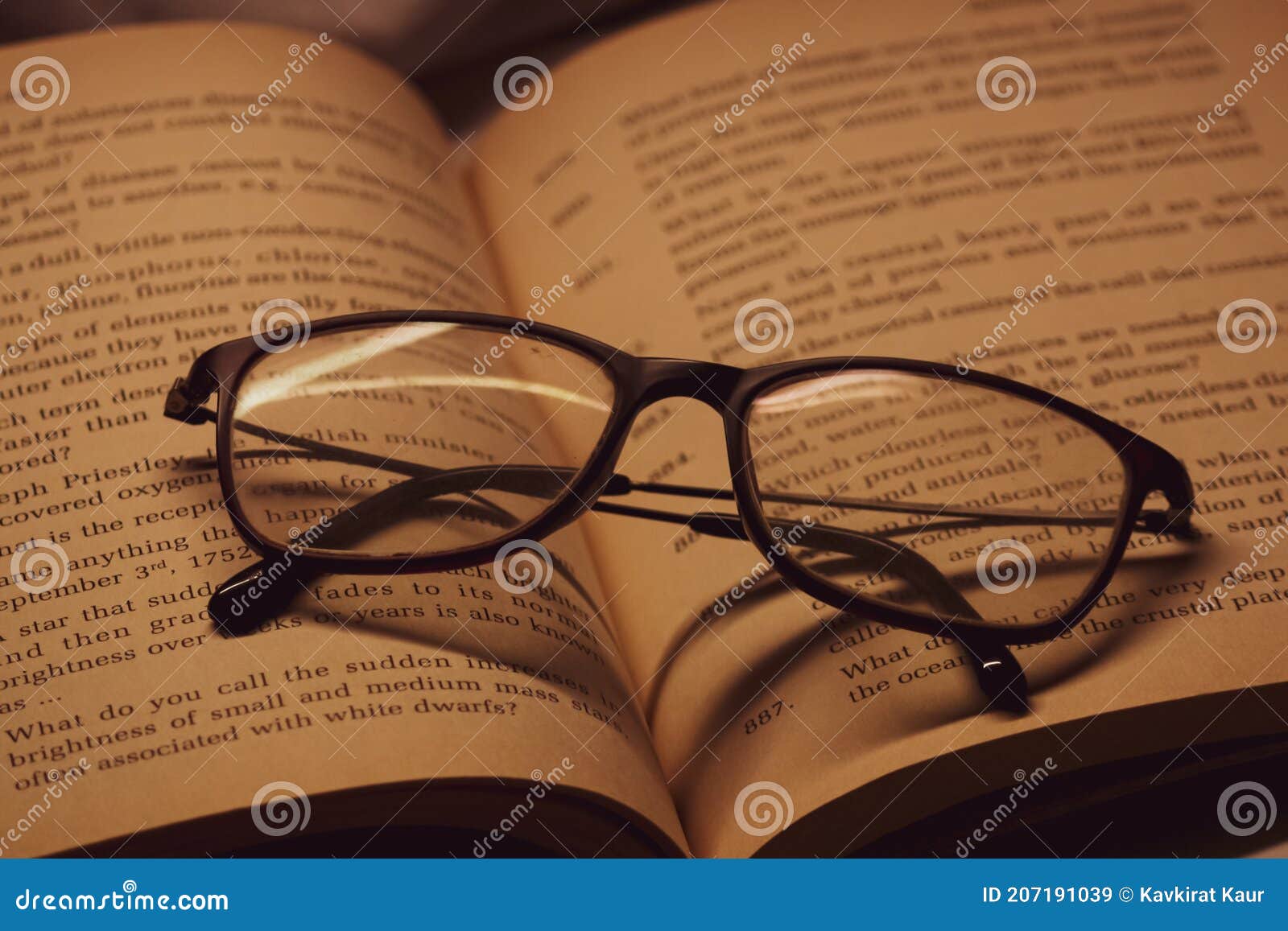 Closeup of a Book with Glasses on it Stock Image Image of read