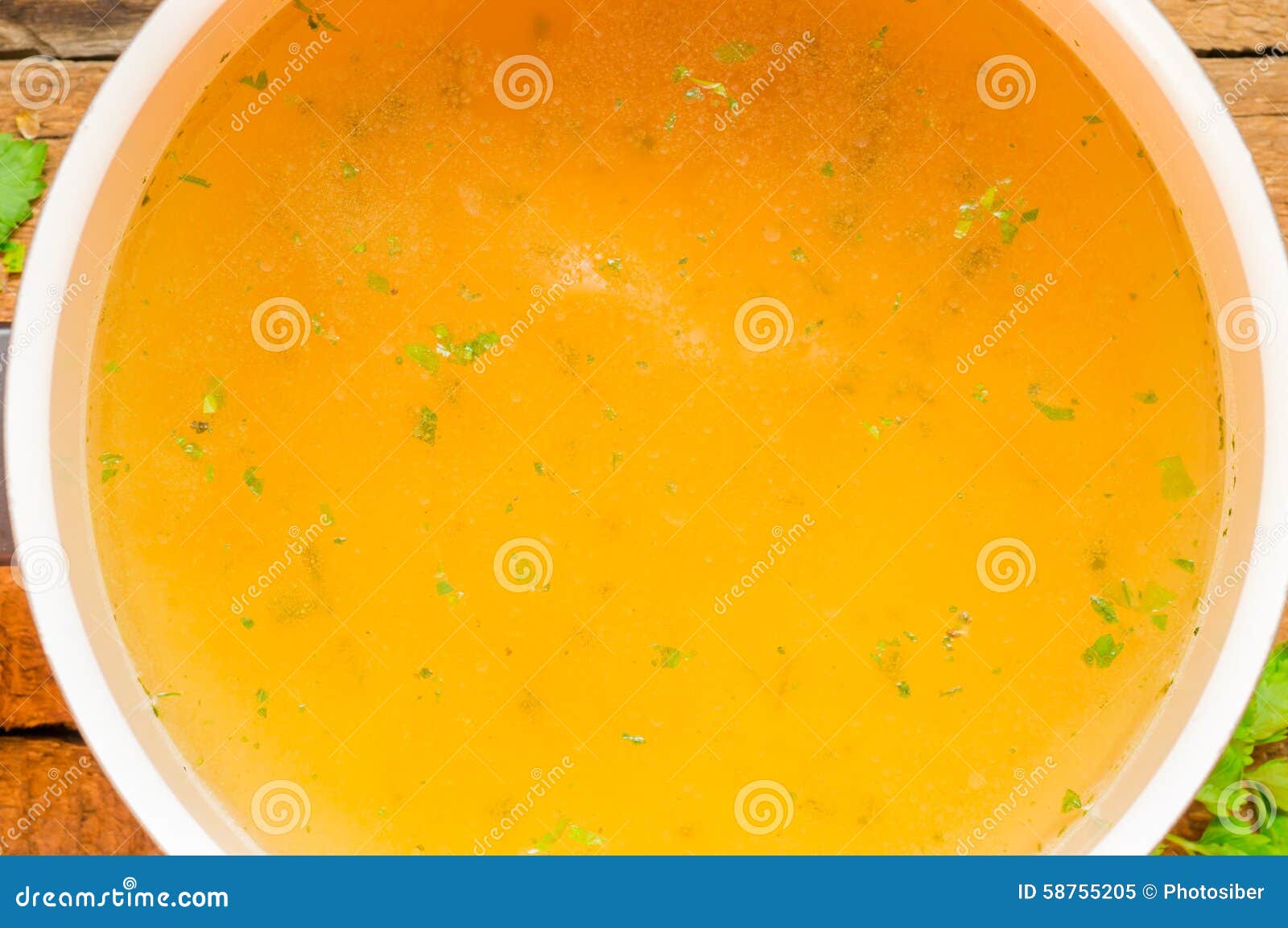 Closeup of Broth, Clear Soup or Bouillon in a Saucepan Stock Image