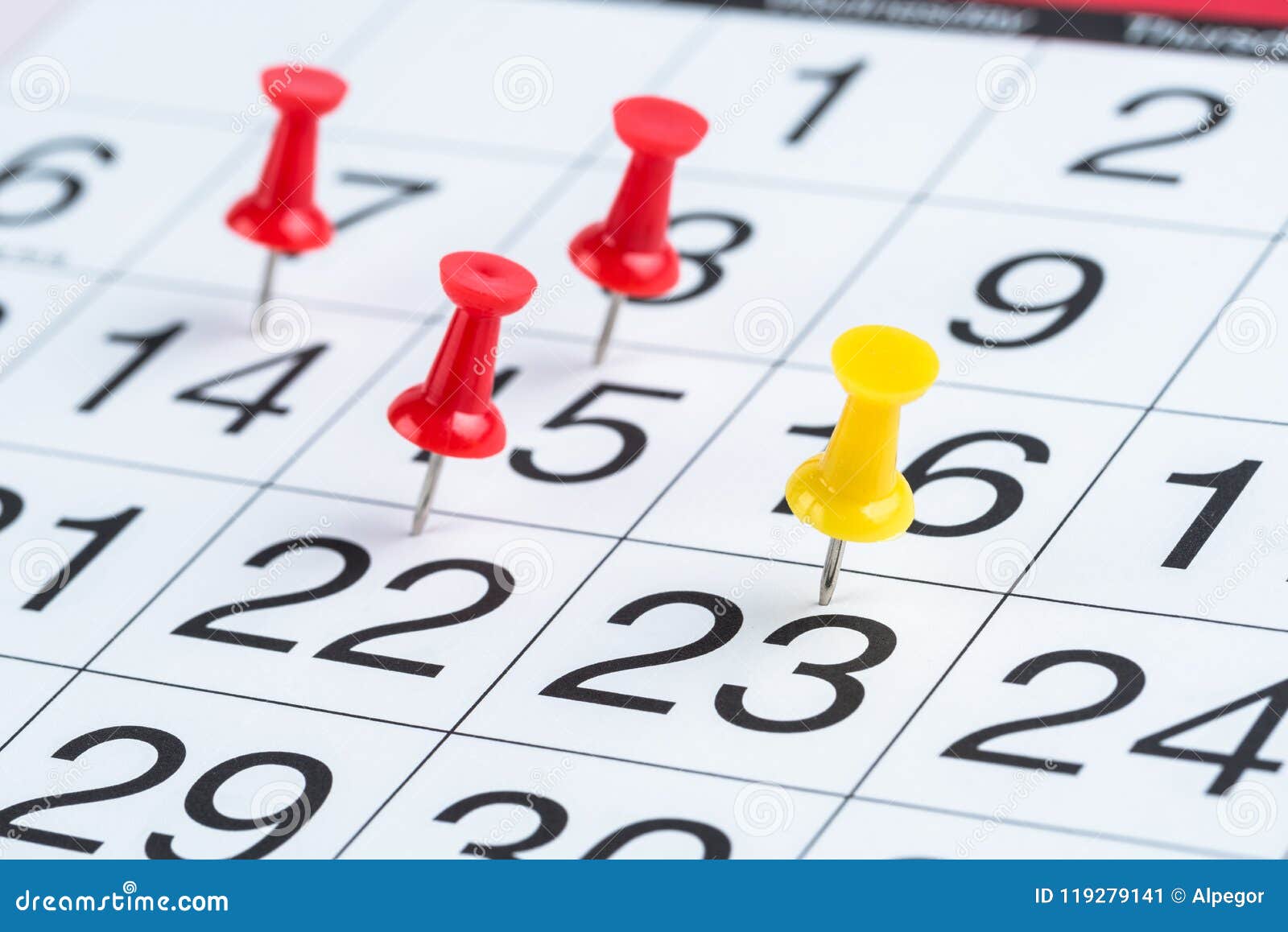 Dates Highlighted by Pushpins on a Calendar Stock Image Image of