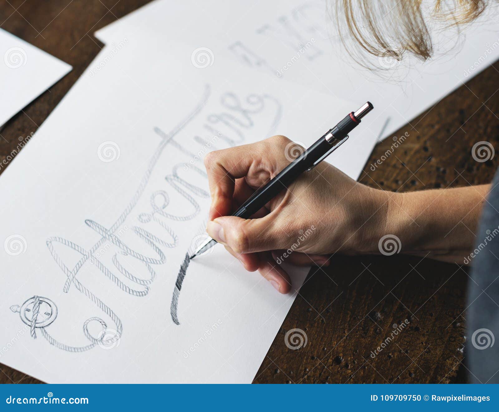 closeup of a calligrapher working on a project