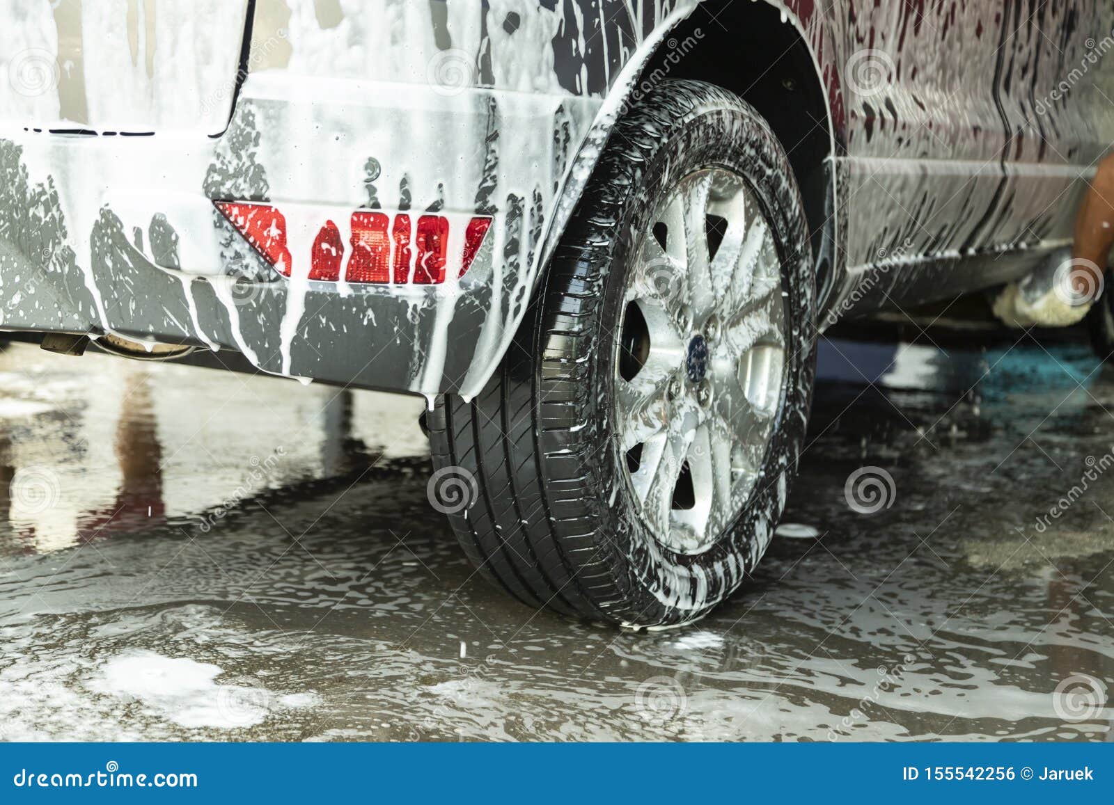 Cleaning The Car With Foam,car Wash Shop Stock Photo, Picture and