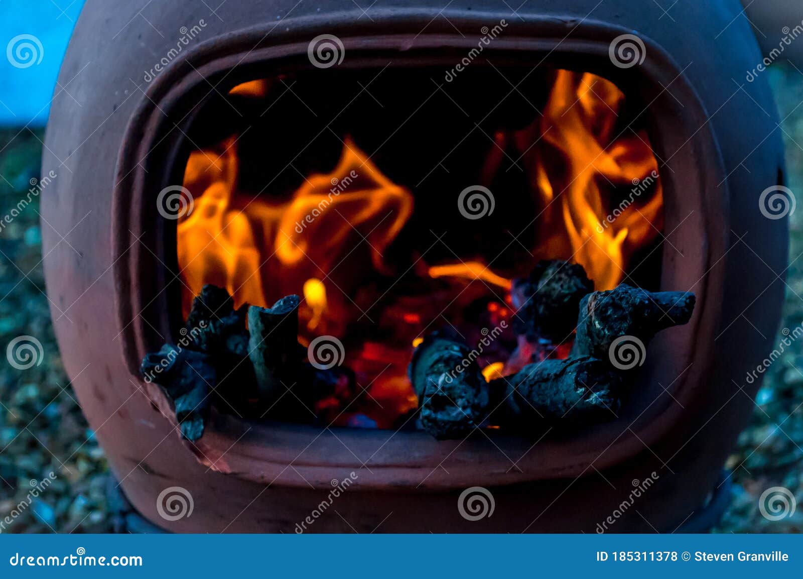 closeup of a chimenea fire on a cold day