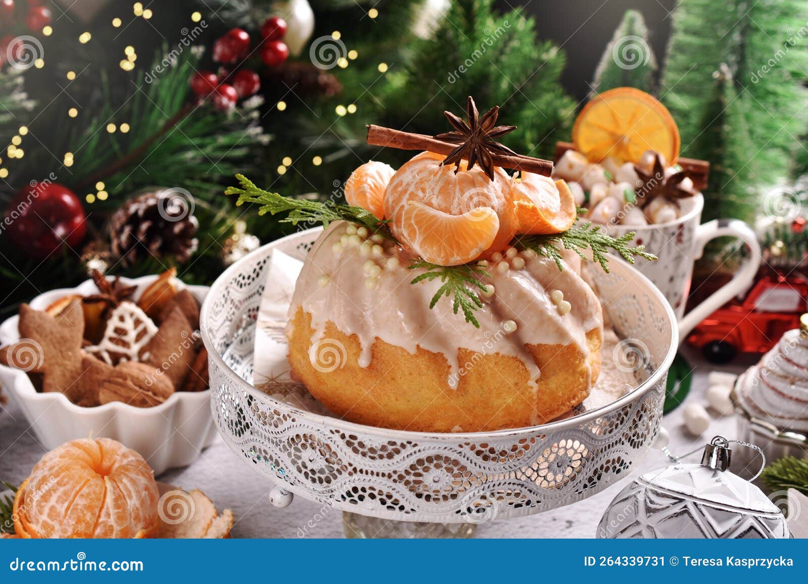 Closeup of Christmas Ring Cake with Fresh Mandarin Decoration on