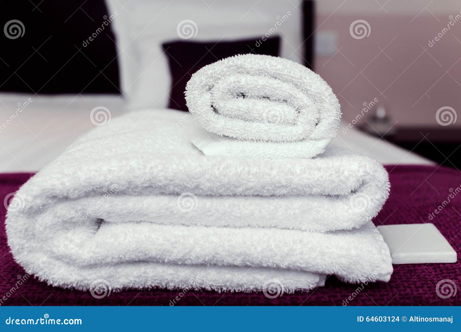 closeup clean towels and soap in hotel room hygiene and hospitality concept