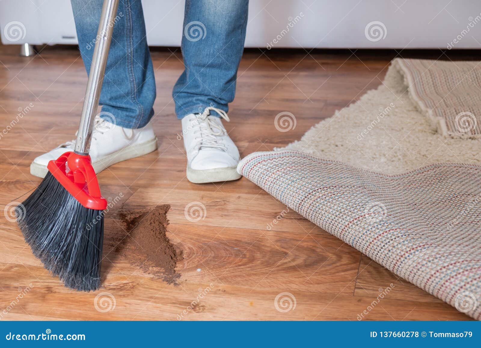 Closeup Cleaning Man Sweeping Wooden Floor With Broom Stock Photo