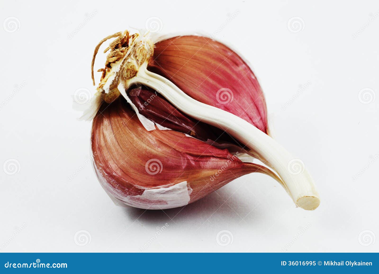 Clove Of Garlic On A Brown Wood Texture Stock Image 185239273