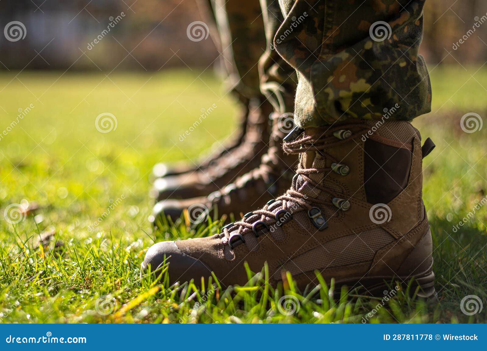 closeup of combat boots of the german army bundeswehr in the grass