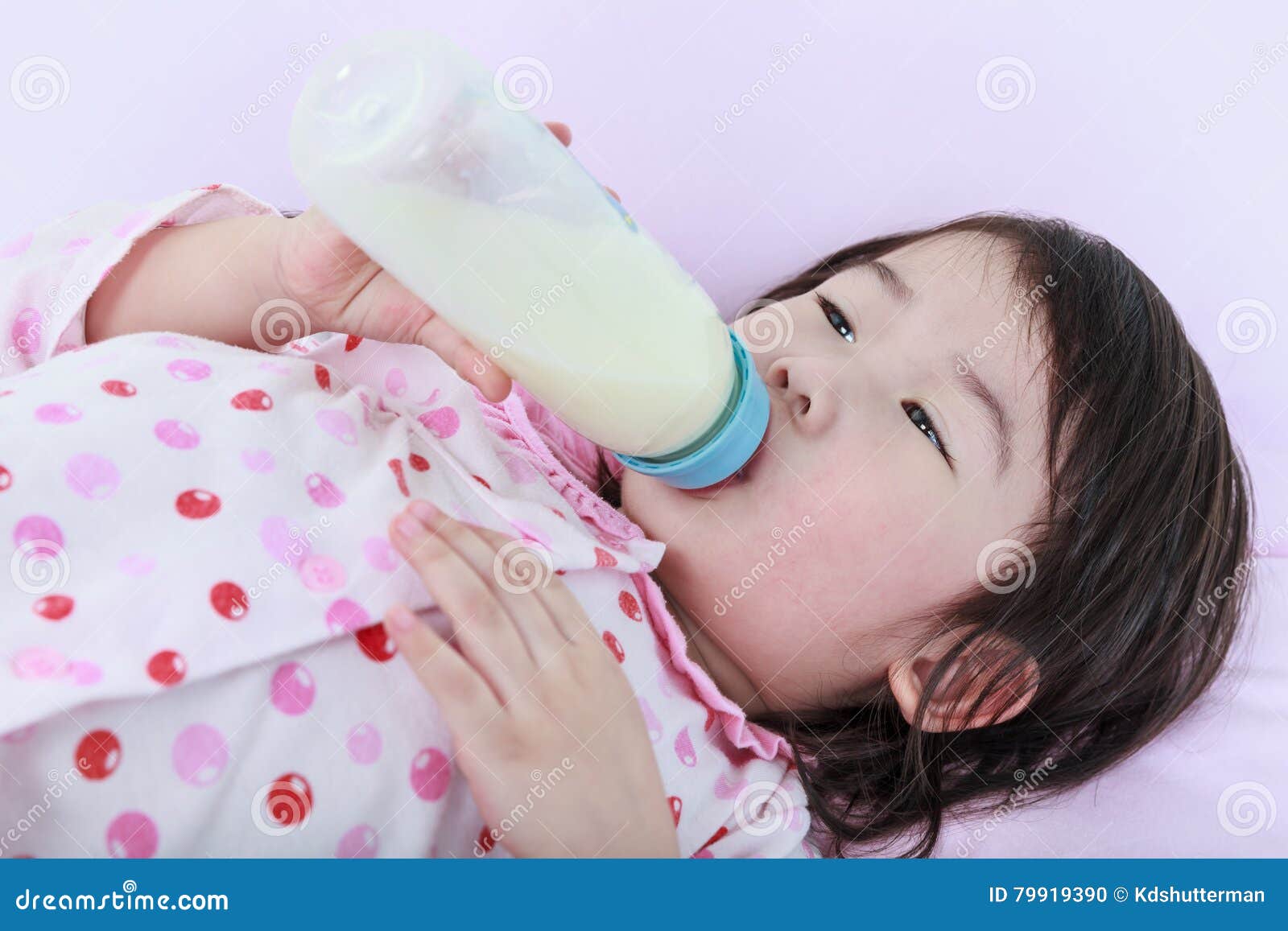 Closeup Cute Asian Girl Suck Up Milk Bottle Drinking Milk For G Stock