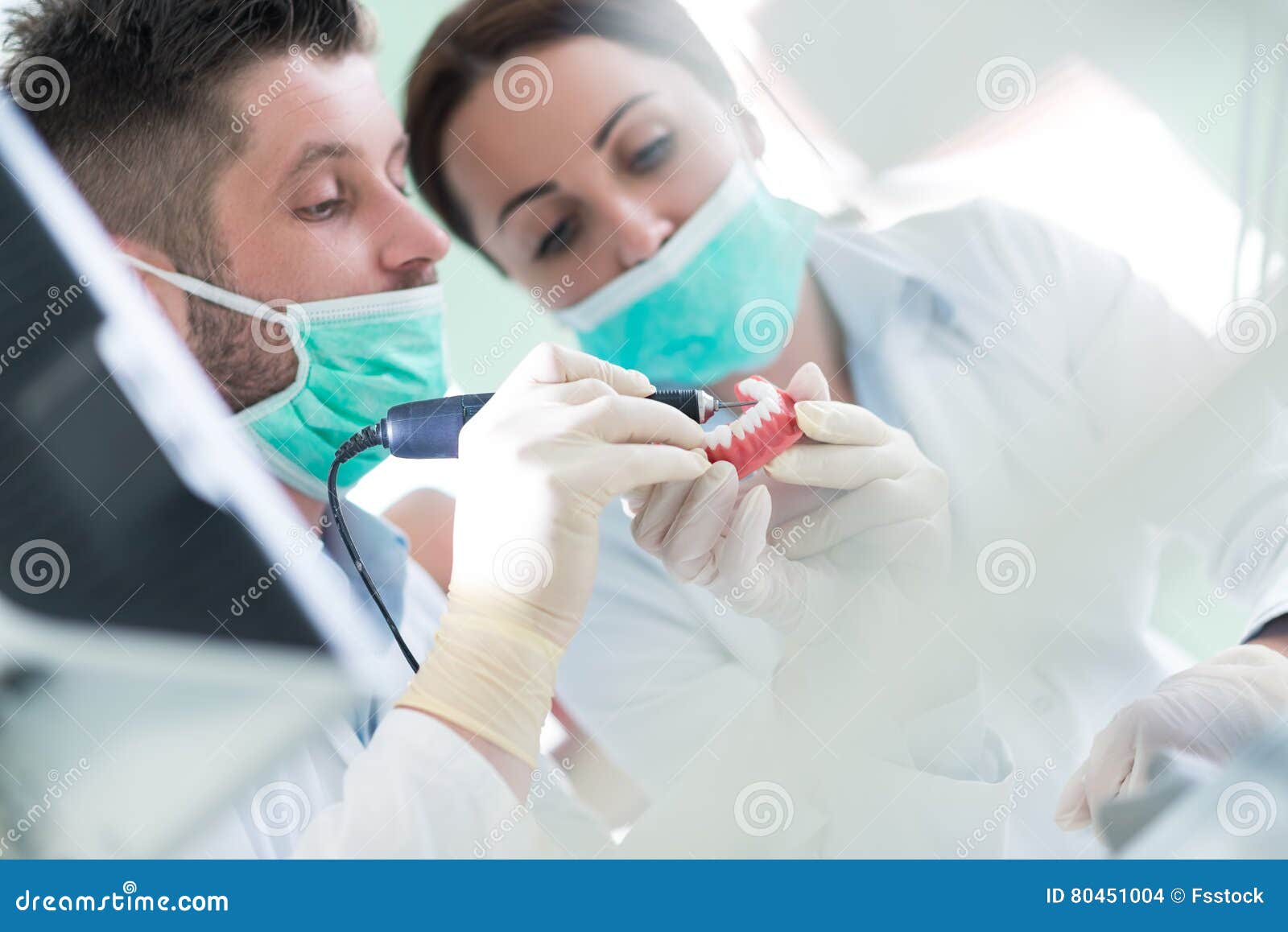 Closeup of Dentistry Student Practicing on a Medical Mannequin Stock