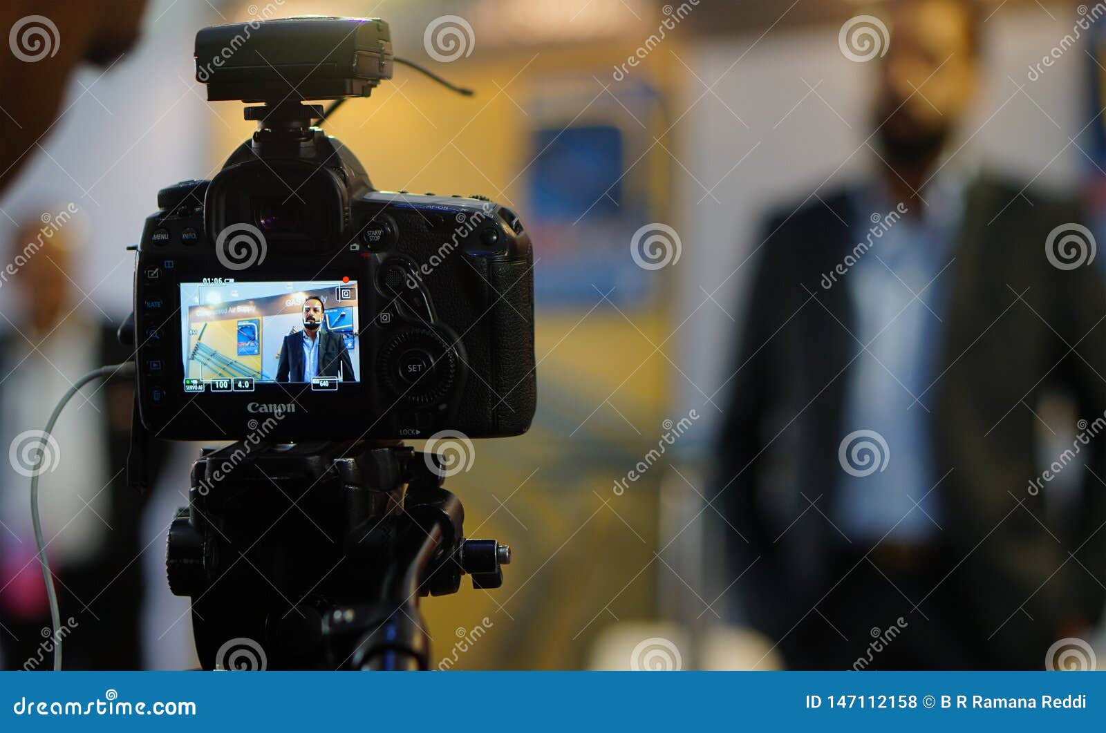 Display or Monitor of DSLR Camera Shooting Video Interview in a Trade