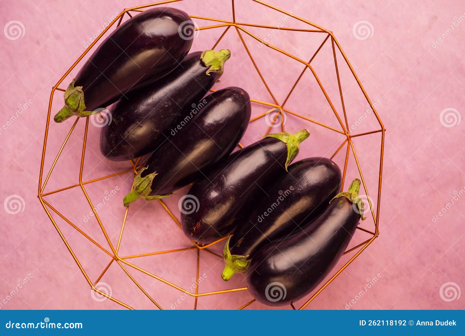 Eggplants in an iron bowl stock photo. Image of objects 262118192