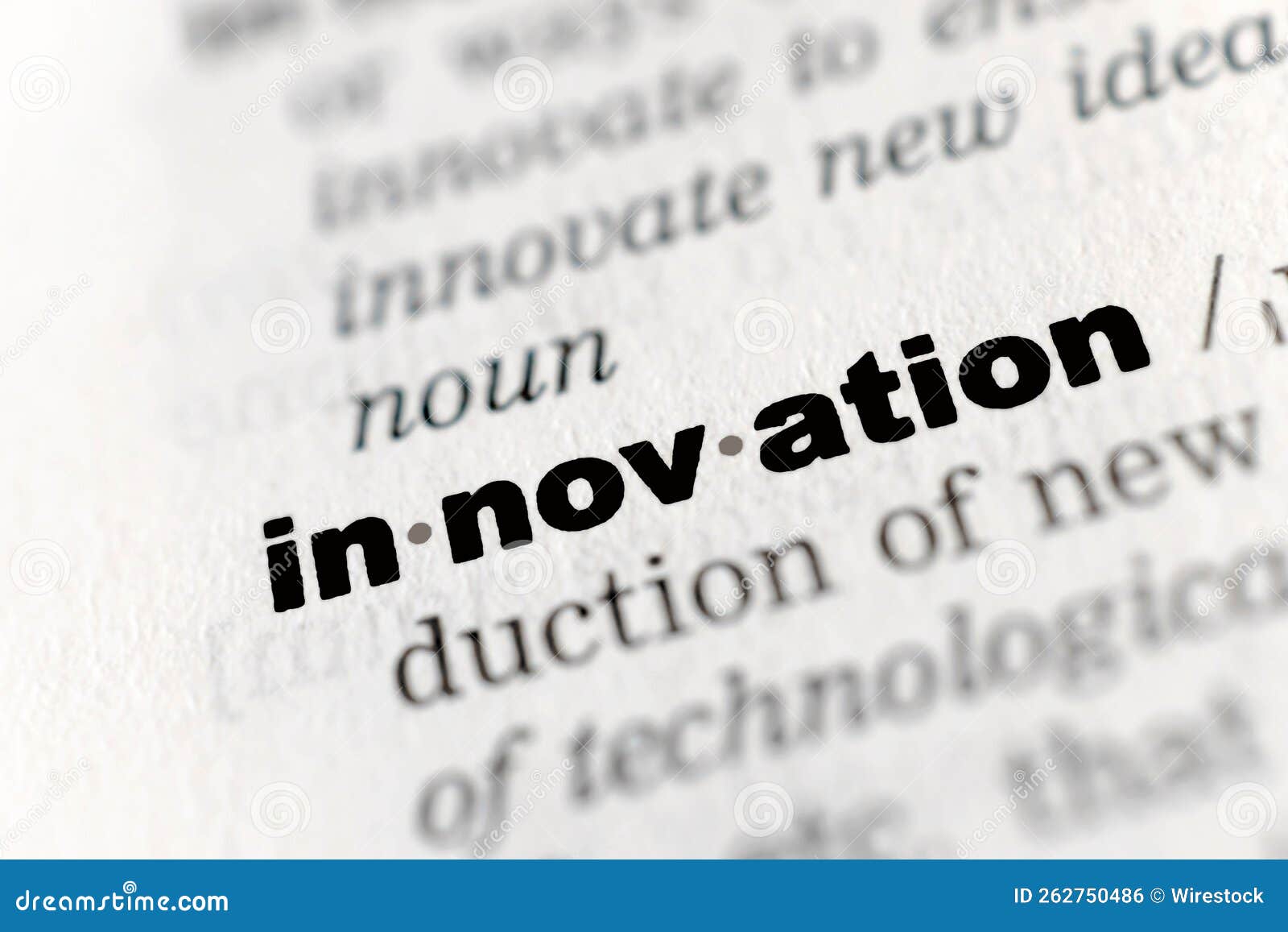 Closeup of an English Dictionary Page with the Word "innovation" Stock