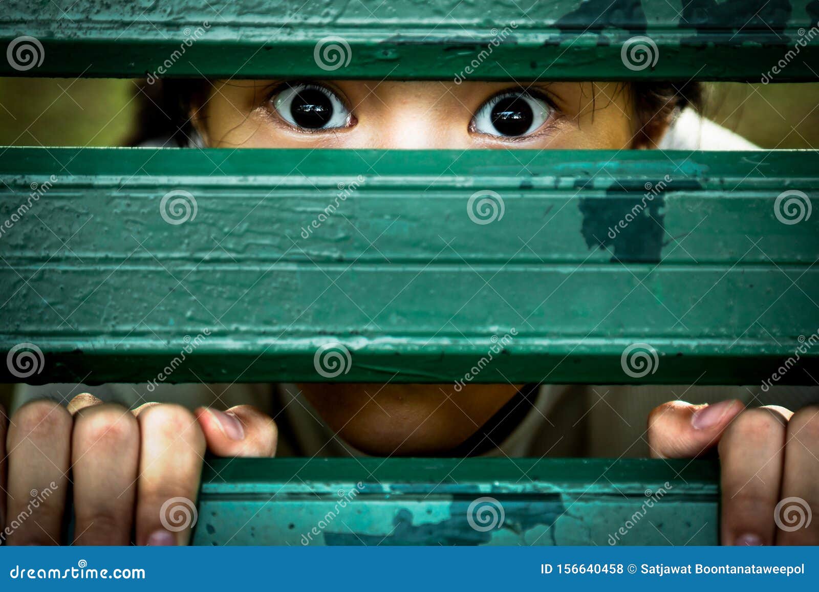 closeup of face and eyes of sick girl,asian little child sneak peek,peeping spying eyes,suspiciously young woman feeling afraid