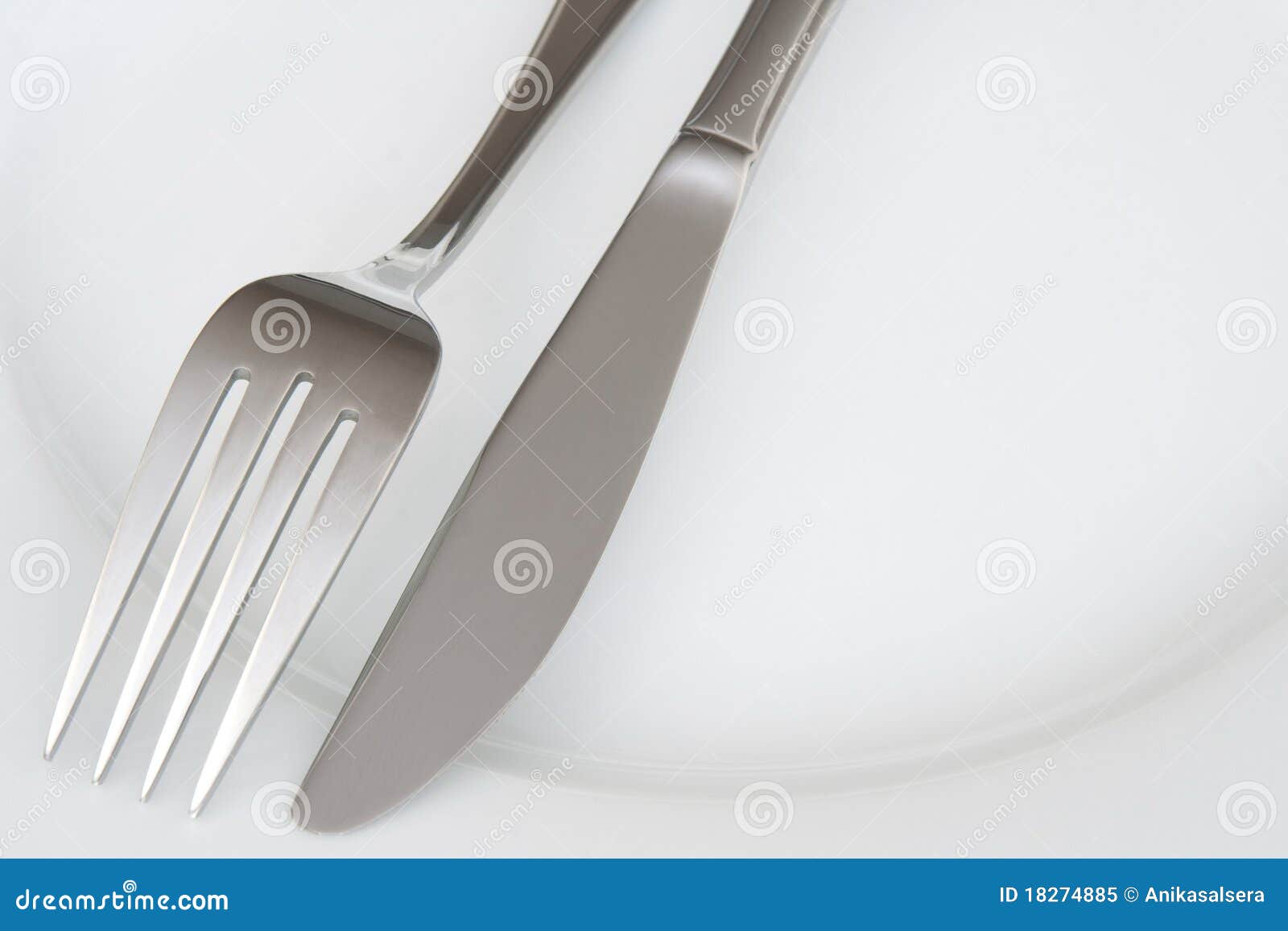 Closeup of Fork and Knife on a Plate Stock Image Image of kitchenware