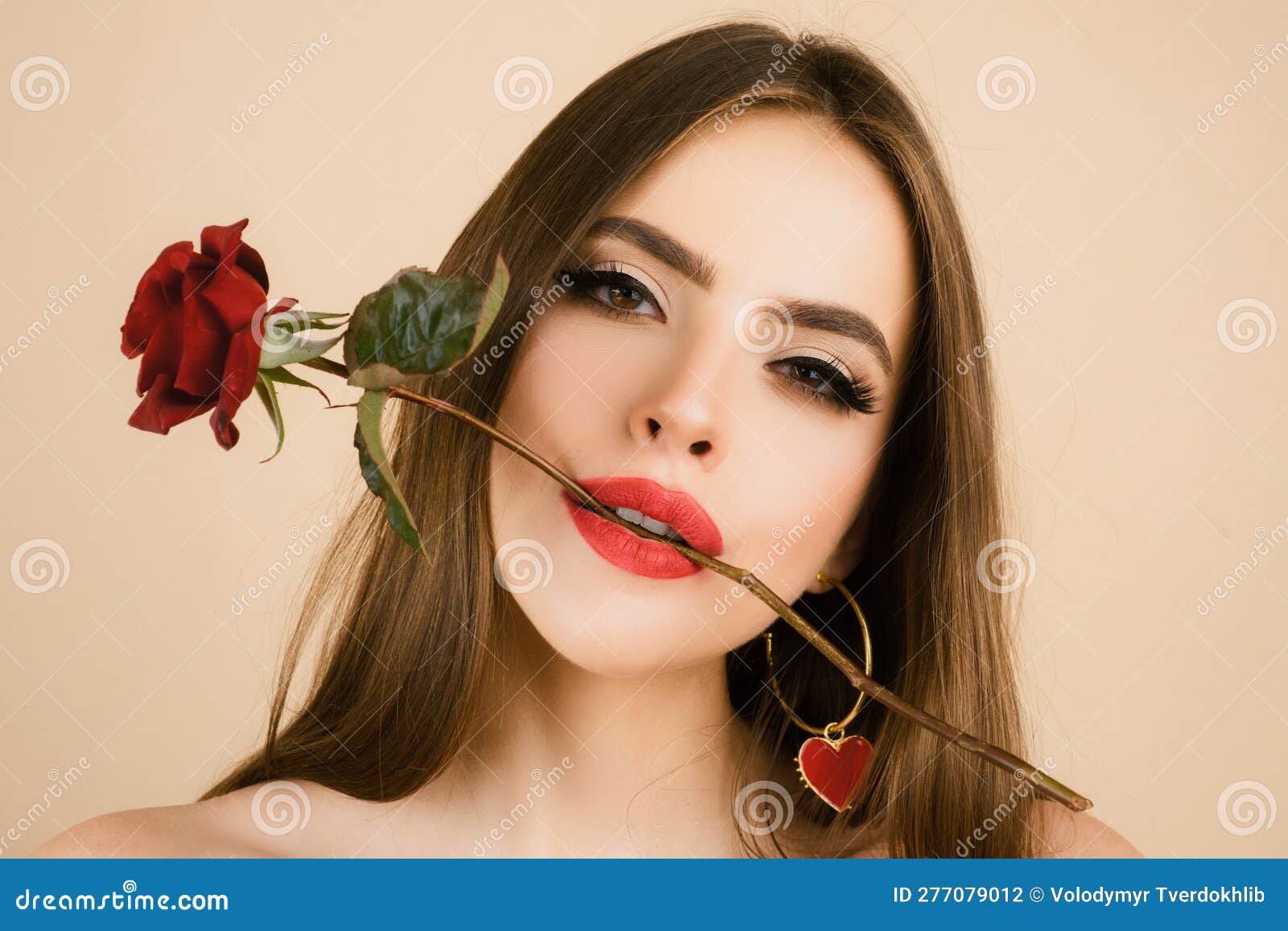 closeup fresh face girl. brunette woman with red rose. beautiful girl with reses flowers. closeup face of young