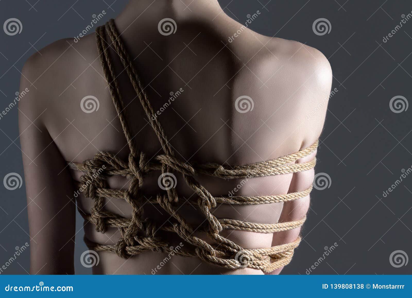 Woman in Art Bandage Tying with Rope Shibari Style pic photo