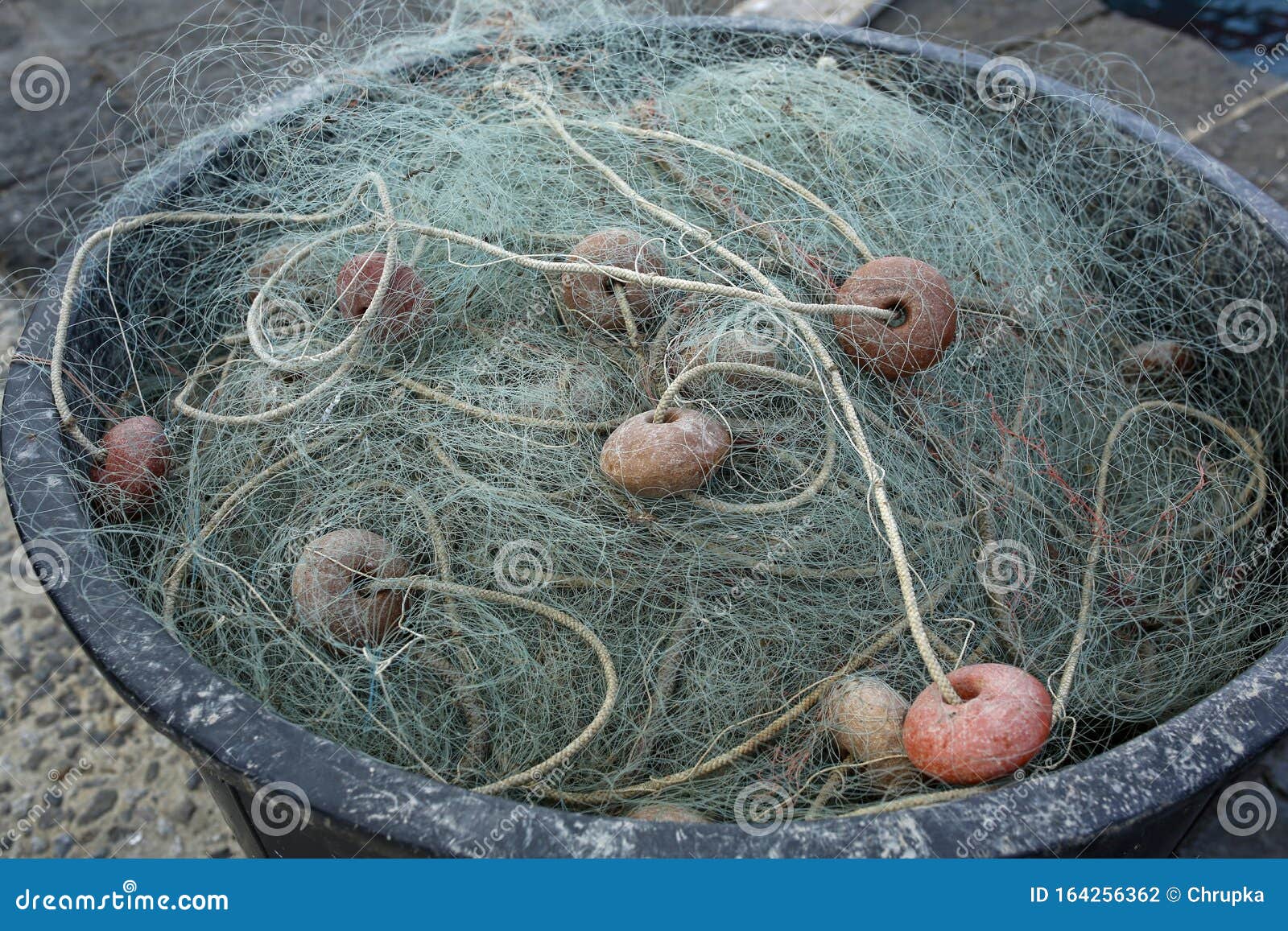 Green Fishing Nets in a Plastic Bucket Stock Photo Image of industry