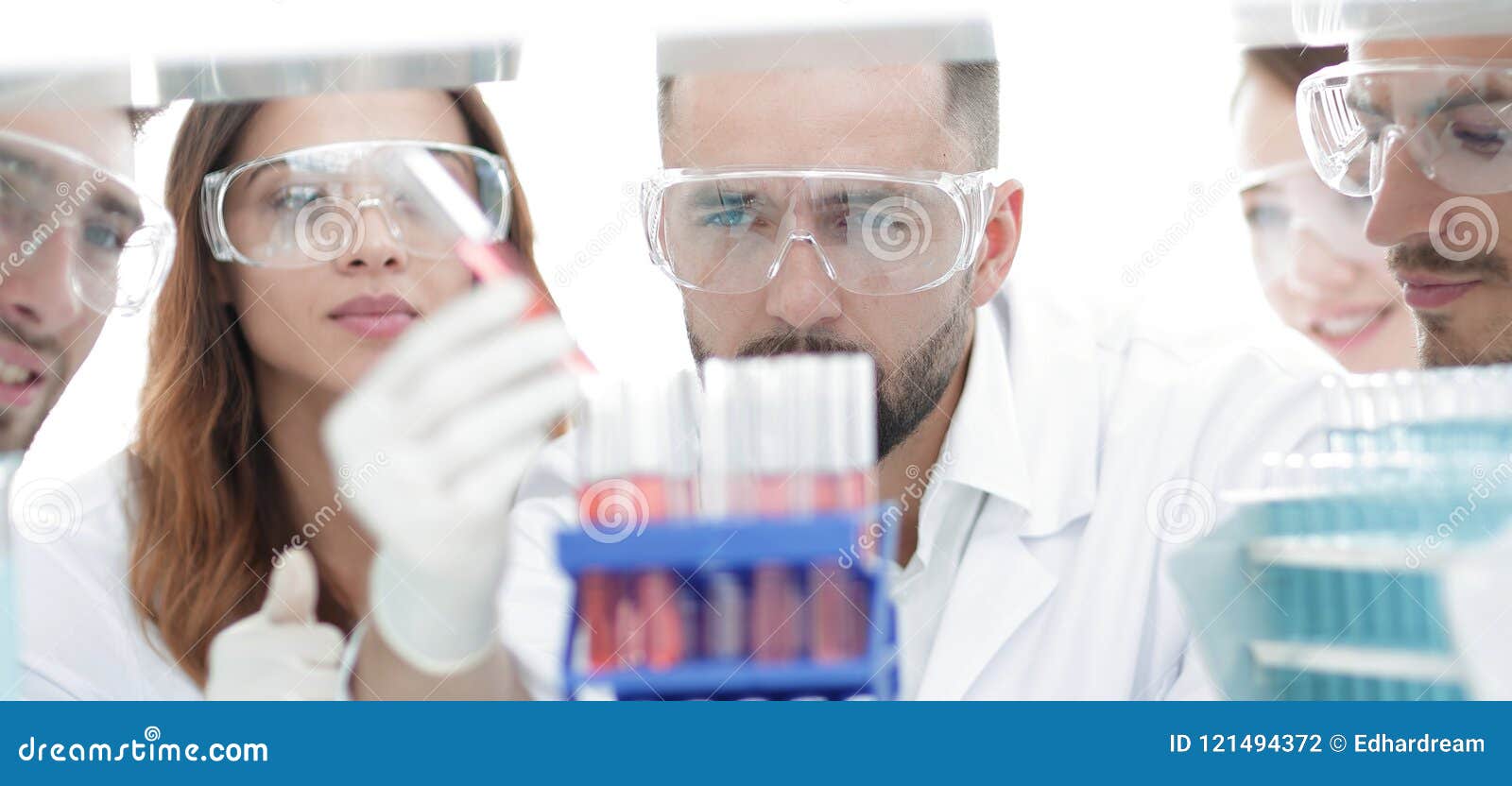 Closeup of a Group of Scientists and Pharmacists in the Laboratory
