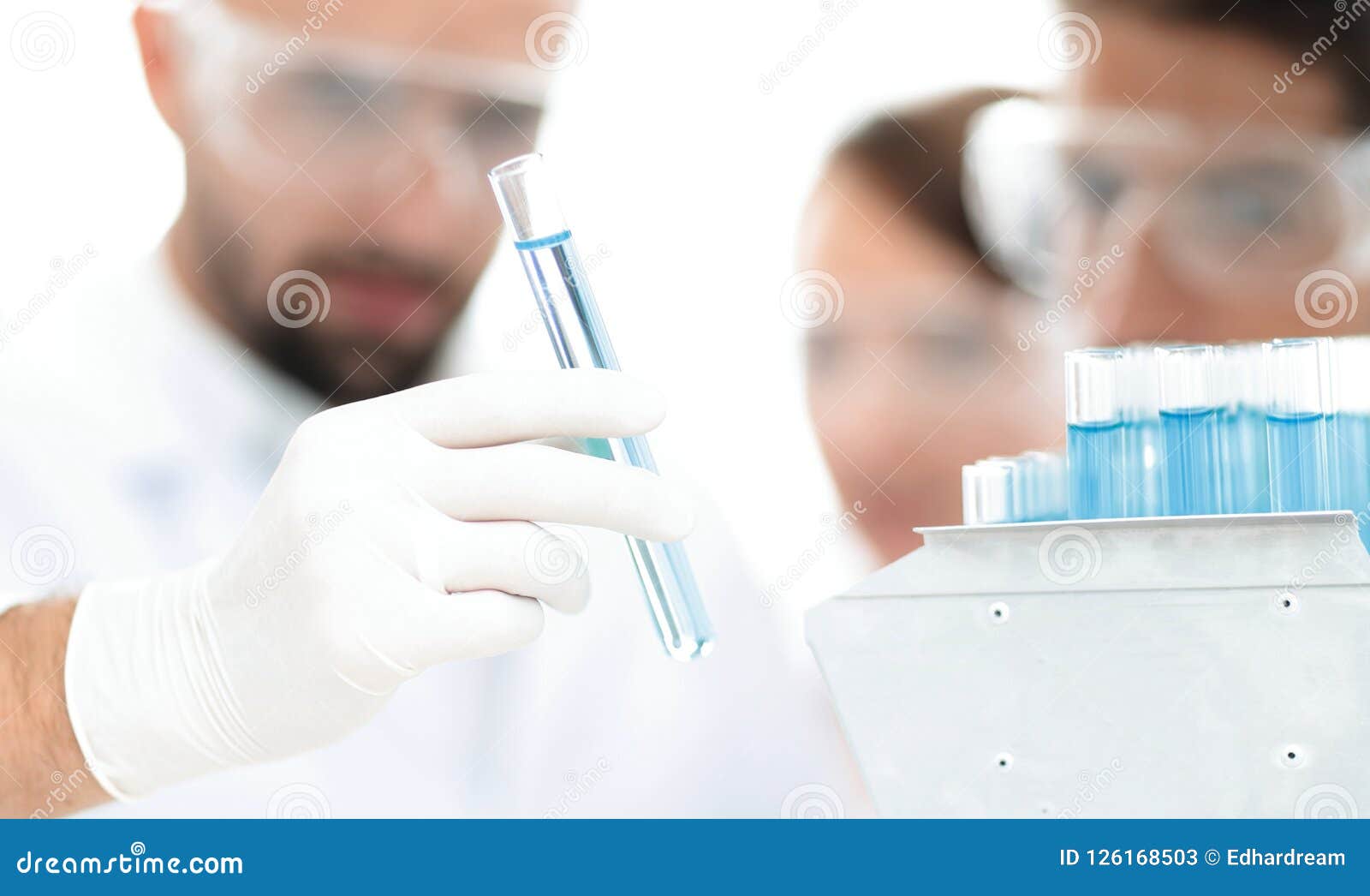 Closeup of a Group of Scientists and Pharmacists in the Laboratory