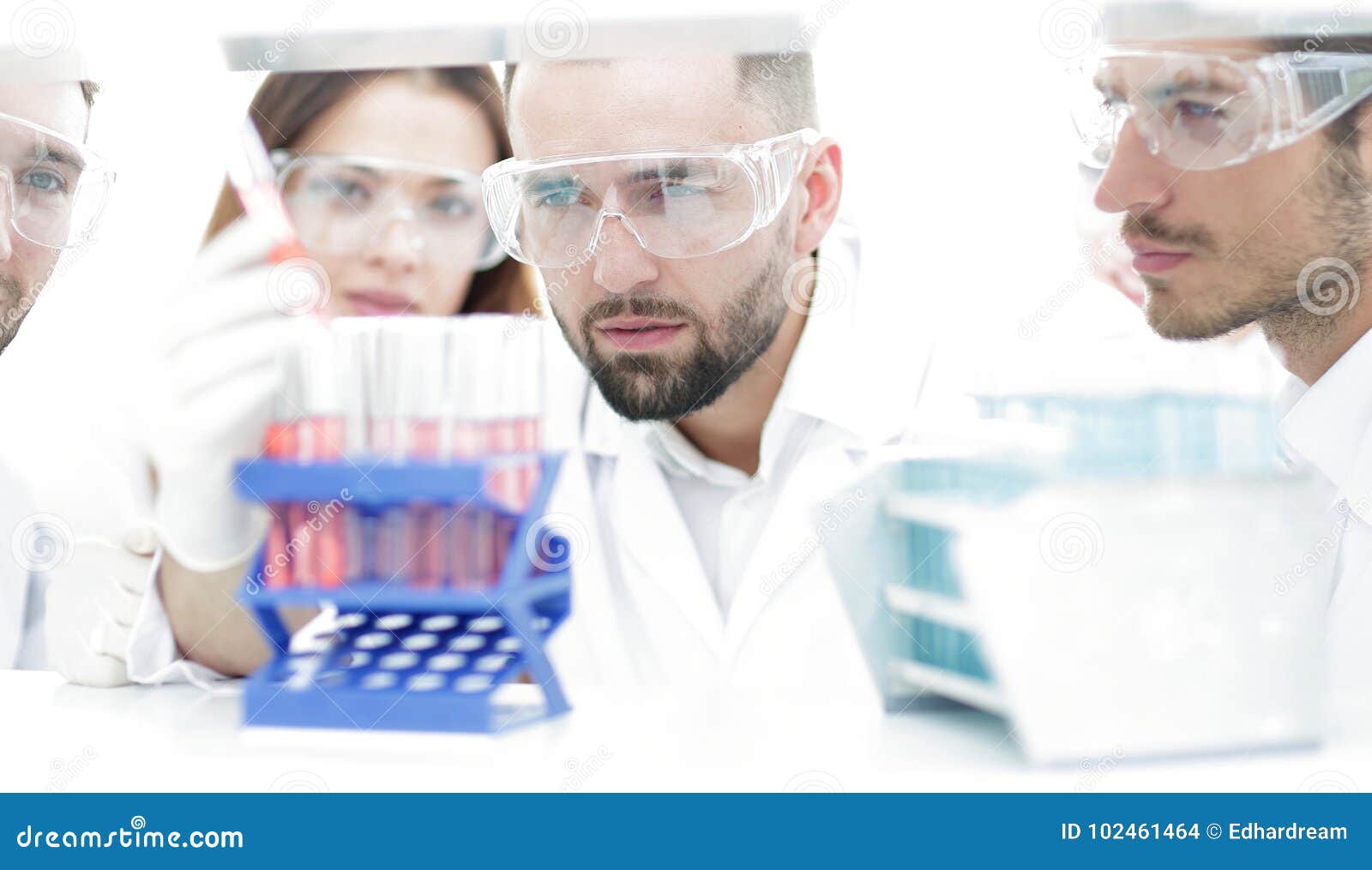Closeup of a Group of Scientists and Pharmacists in the Laboratory