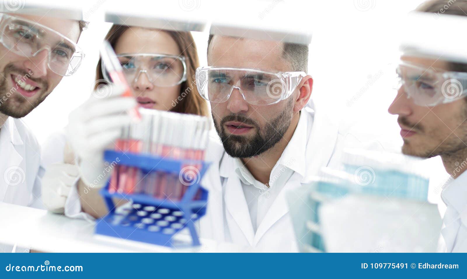 Closeup of a Group of Scientists and Pharmacists in the Laboratory