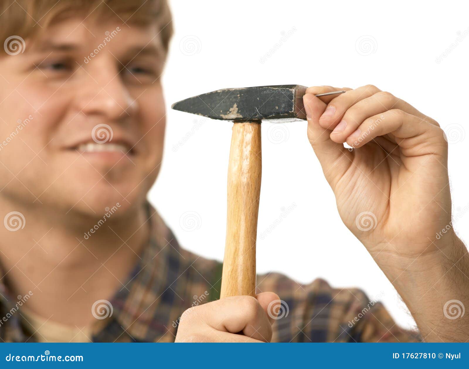 Closeup of hammer and nail stock photo. Image of handyman 17627810