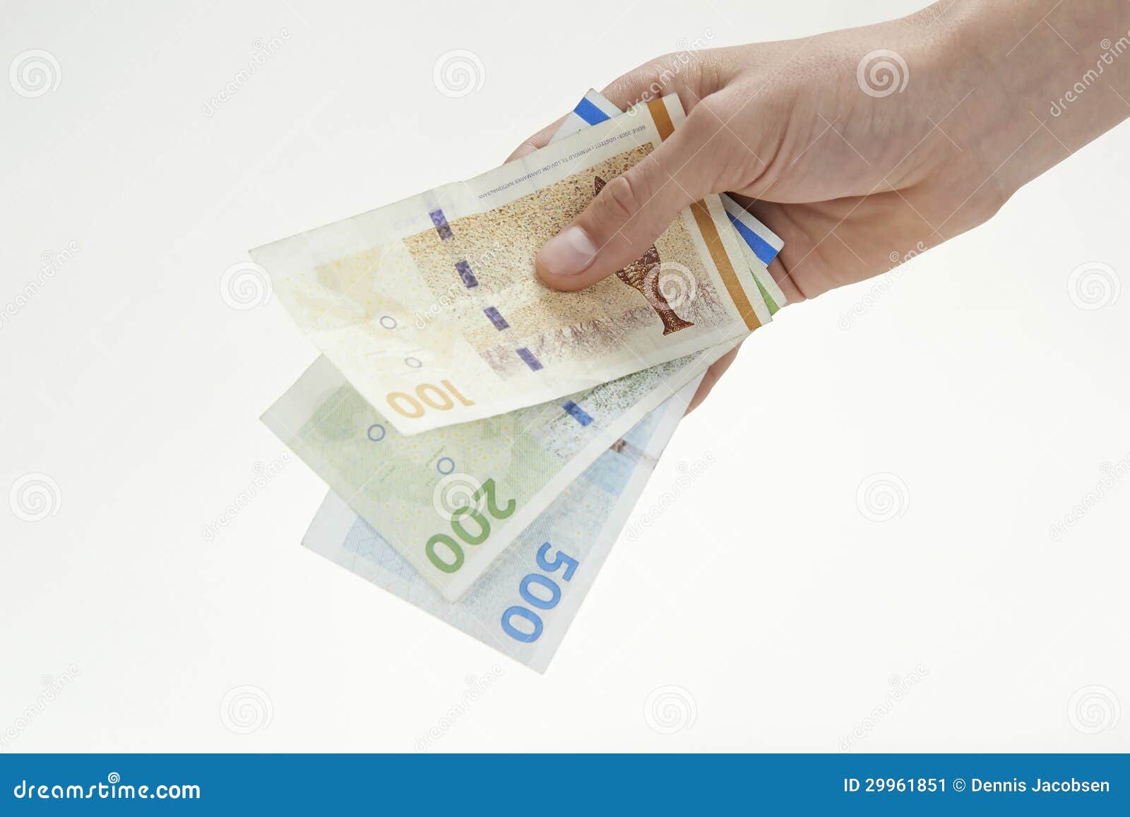 hand holding danish currency